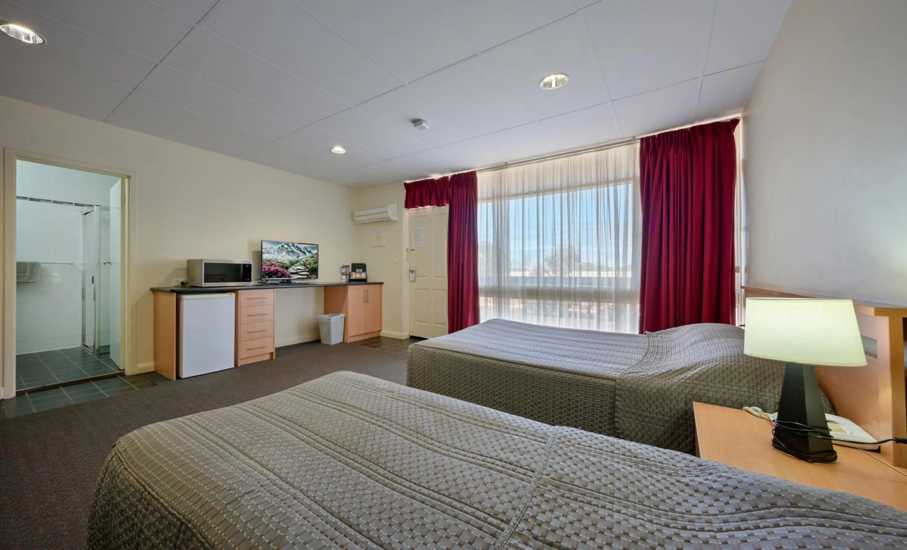 Bed in Westland Hotel Motel