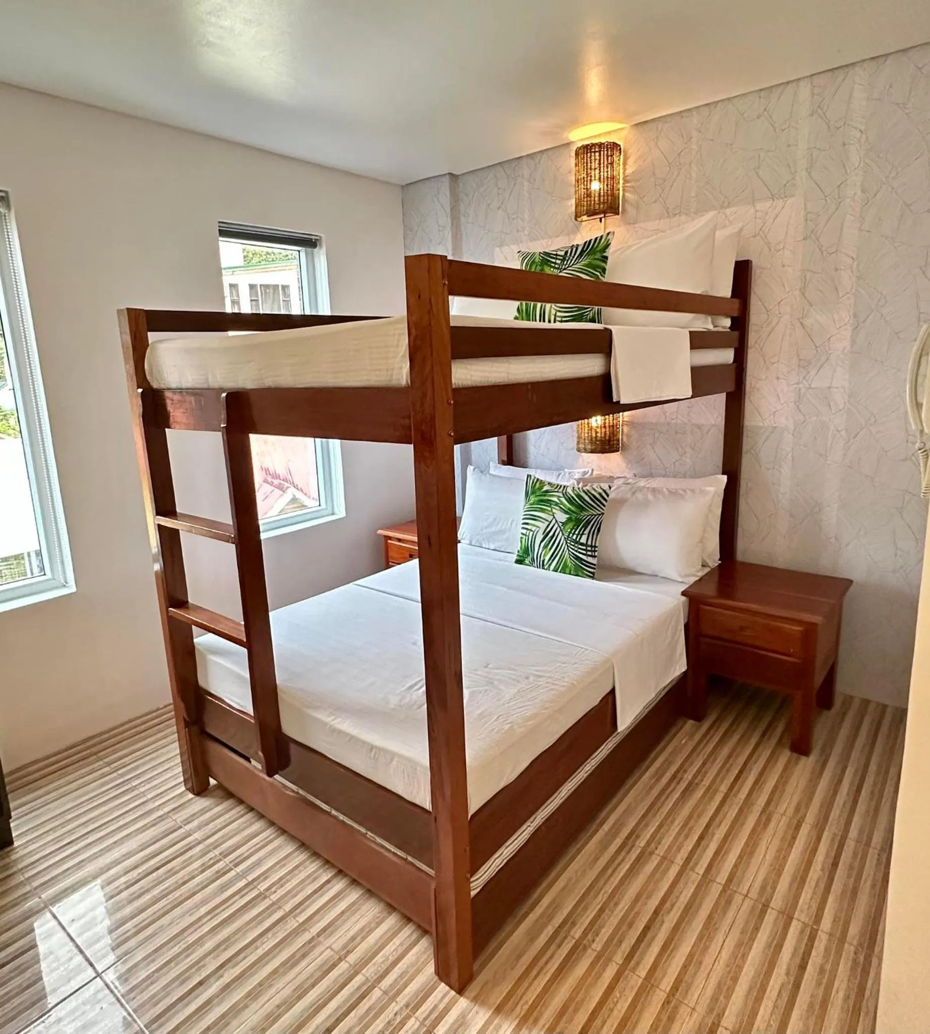 Bed in DENGI INN EL NIDO