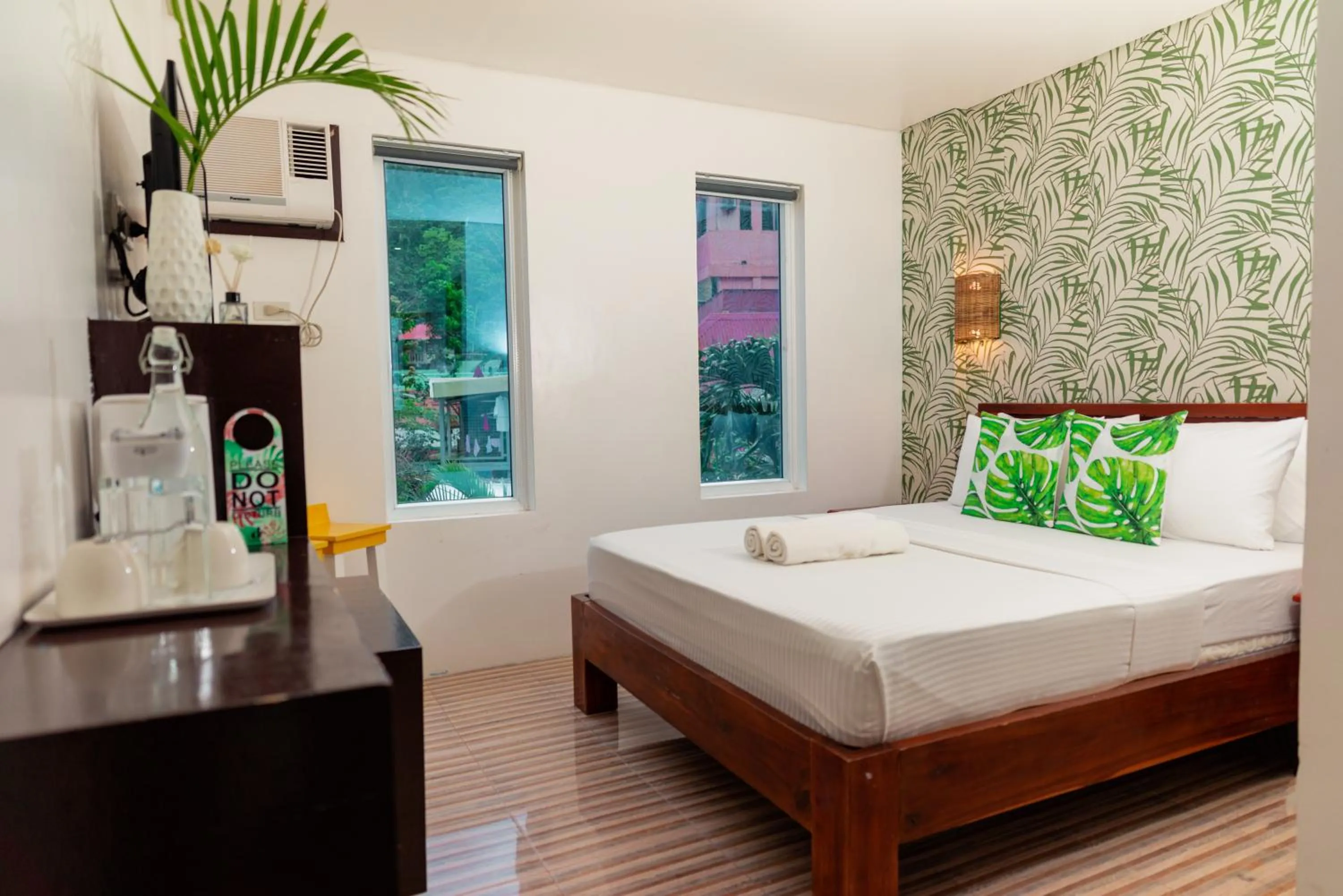 Bed in DENGI INN EL NIDO