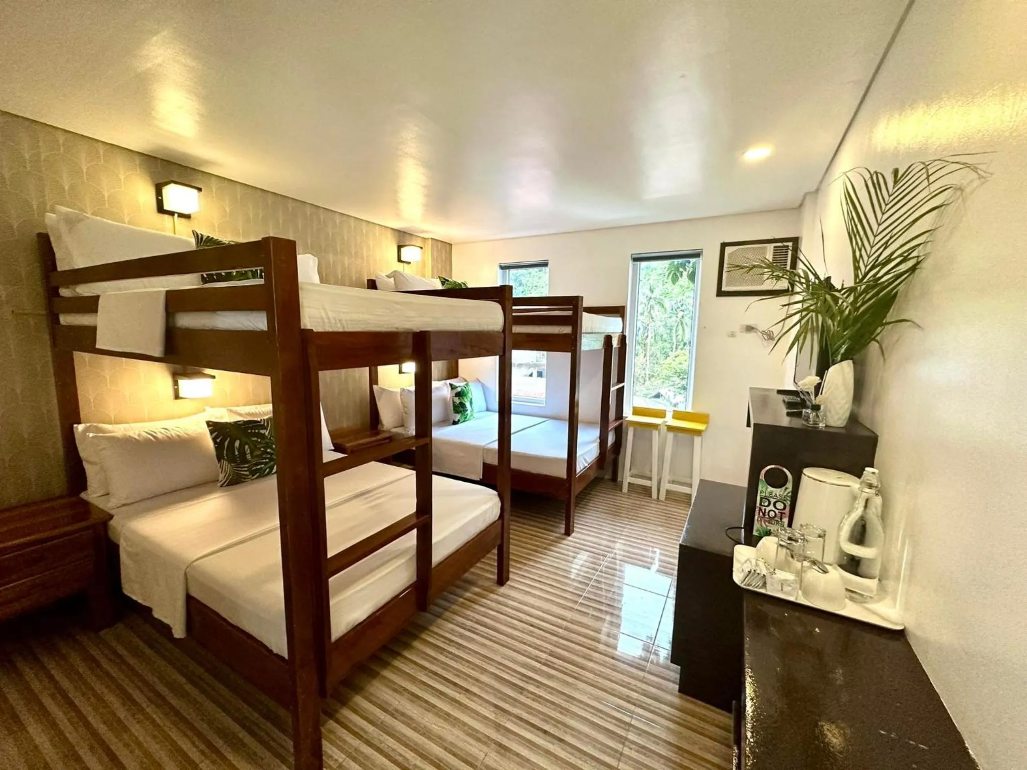 Bed in DENGI INN EL NIDO