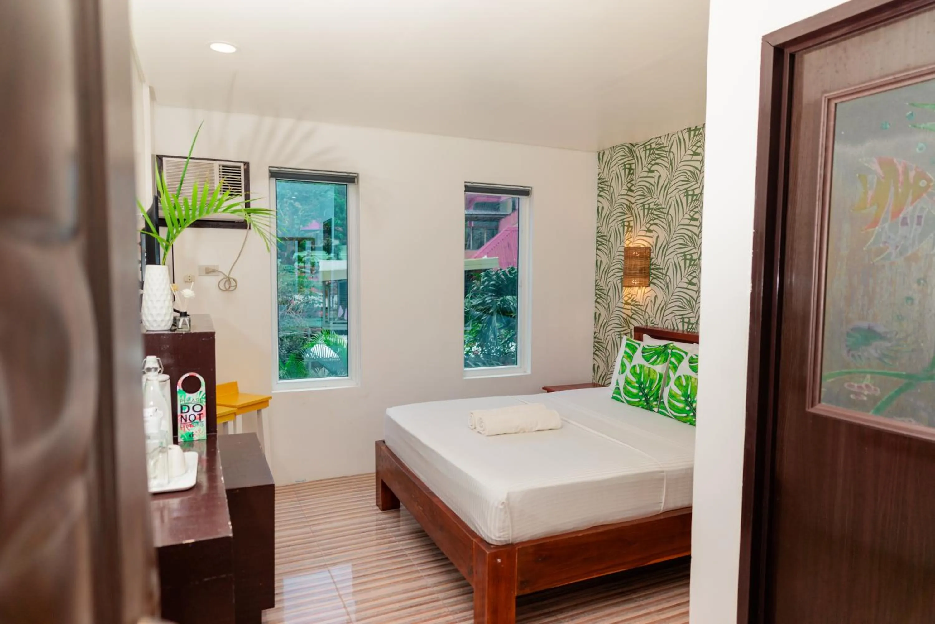 Bed in DENGI INN EL NIDO