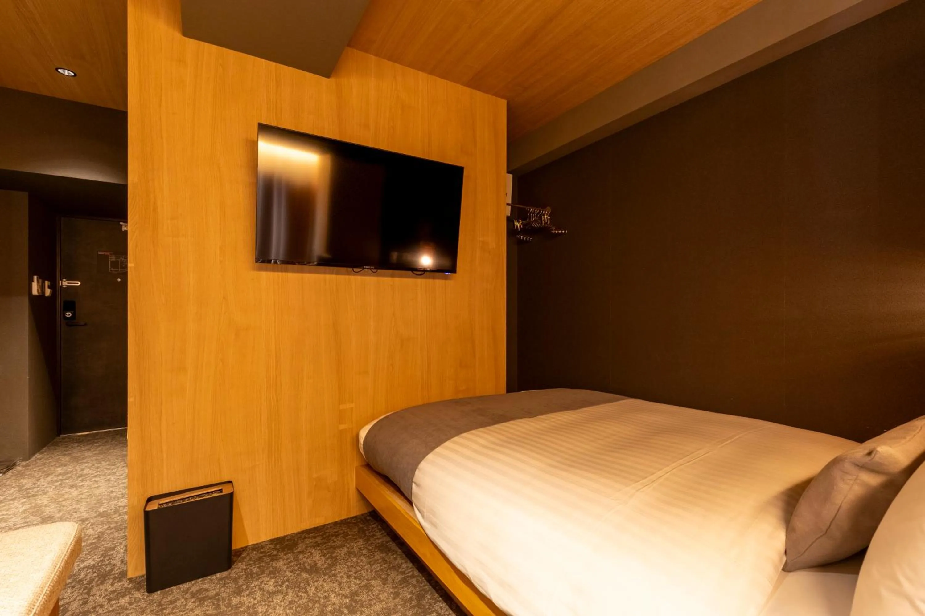 Bed in HOTEL TOMOS ASAKUSA