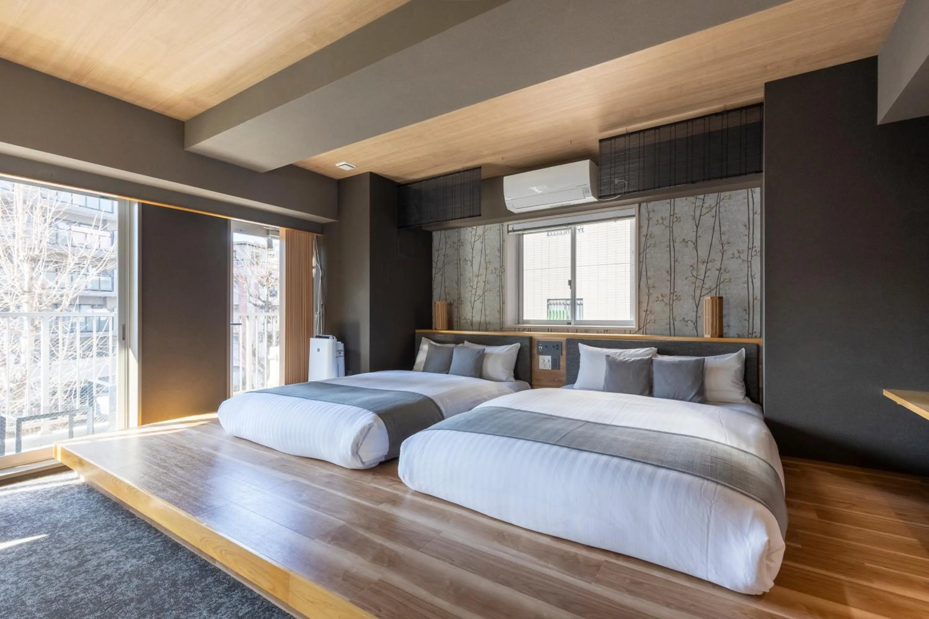 Bed in HOTEL TOMOS ASAKUSA