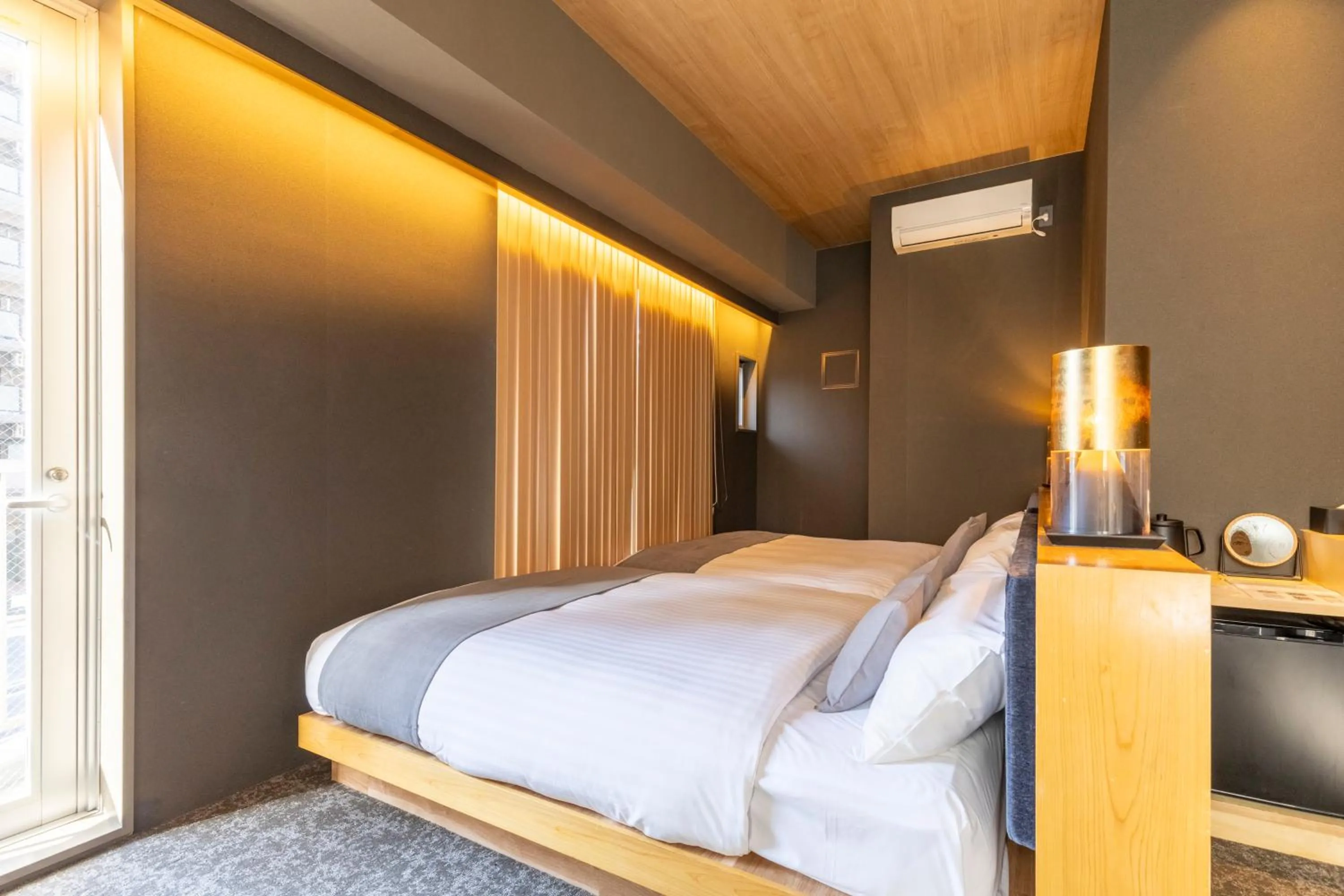 Bed in HOTEL TOMOS ASAKUSA