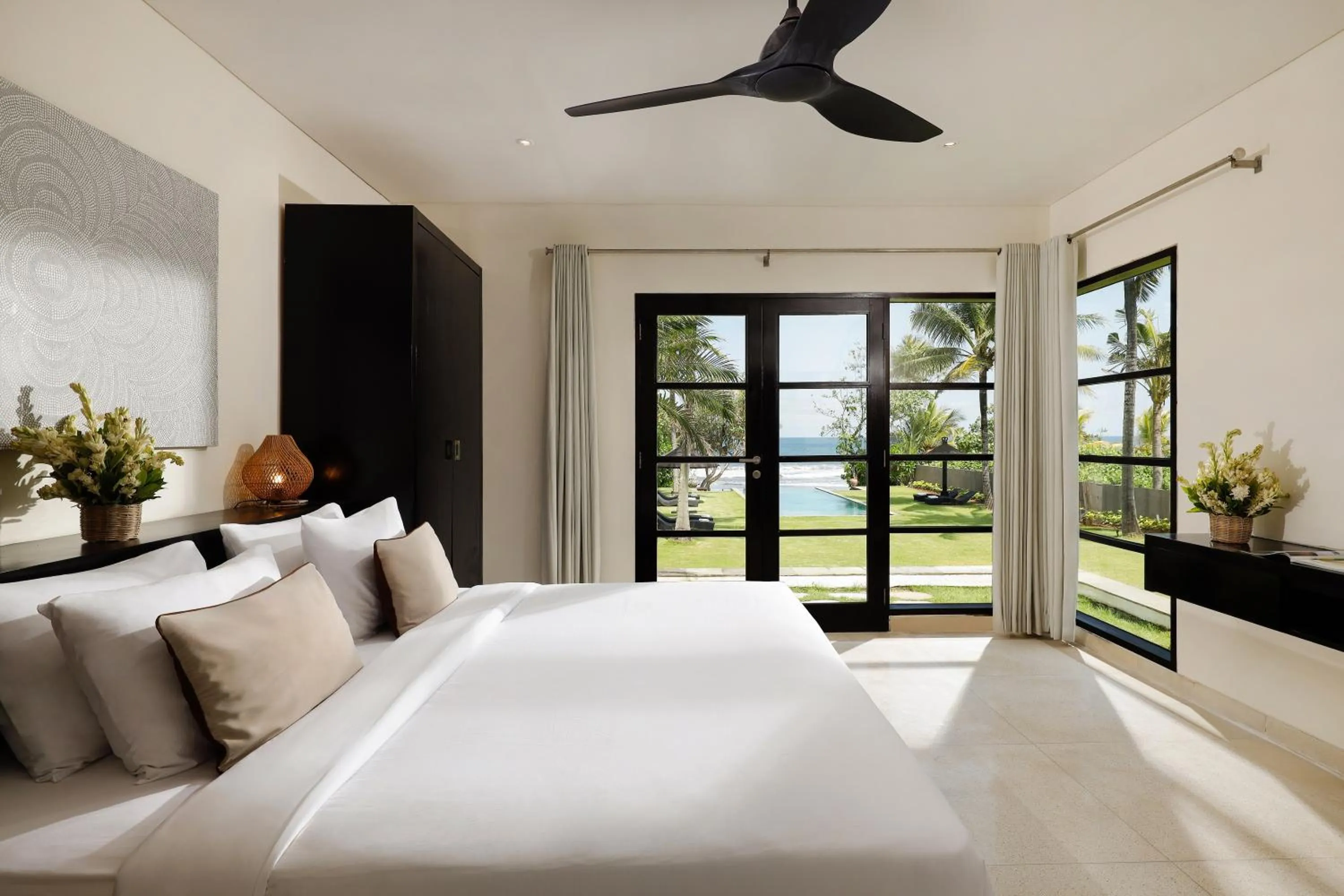 Bed in Black Beach Villa - Absolute Beachfront Escape
