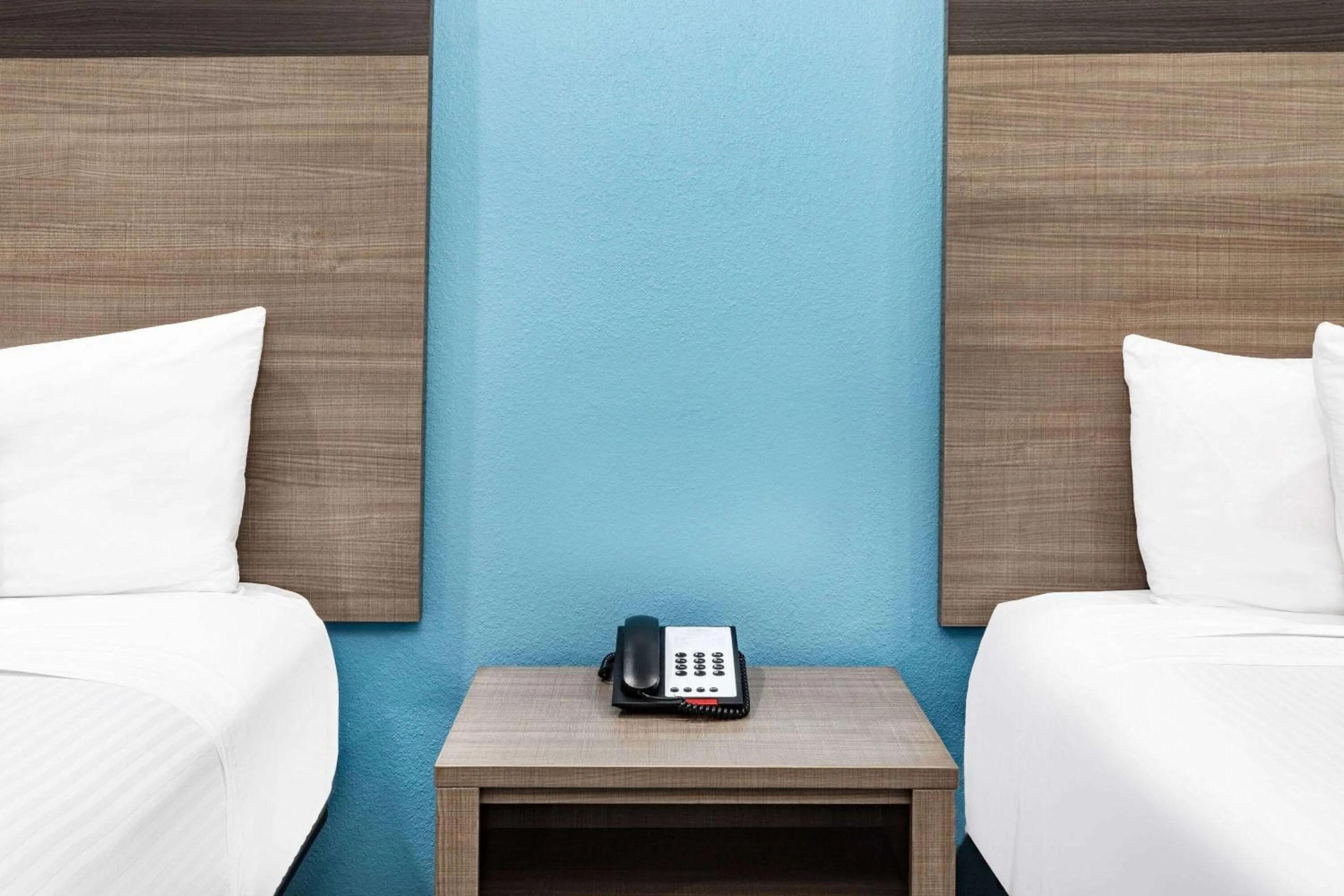 Photo of the whole room, Bed in Baymont by Wyndham Freeport Texas