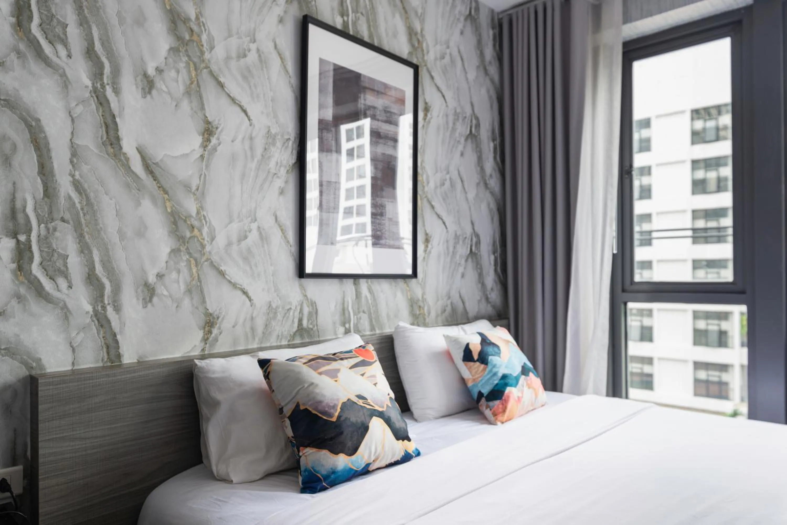 Bed in Dazzle Sukhumvit 7 by LeFoyer