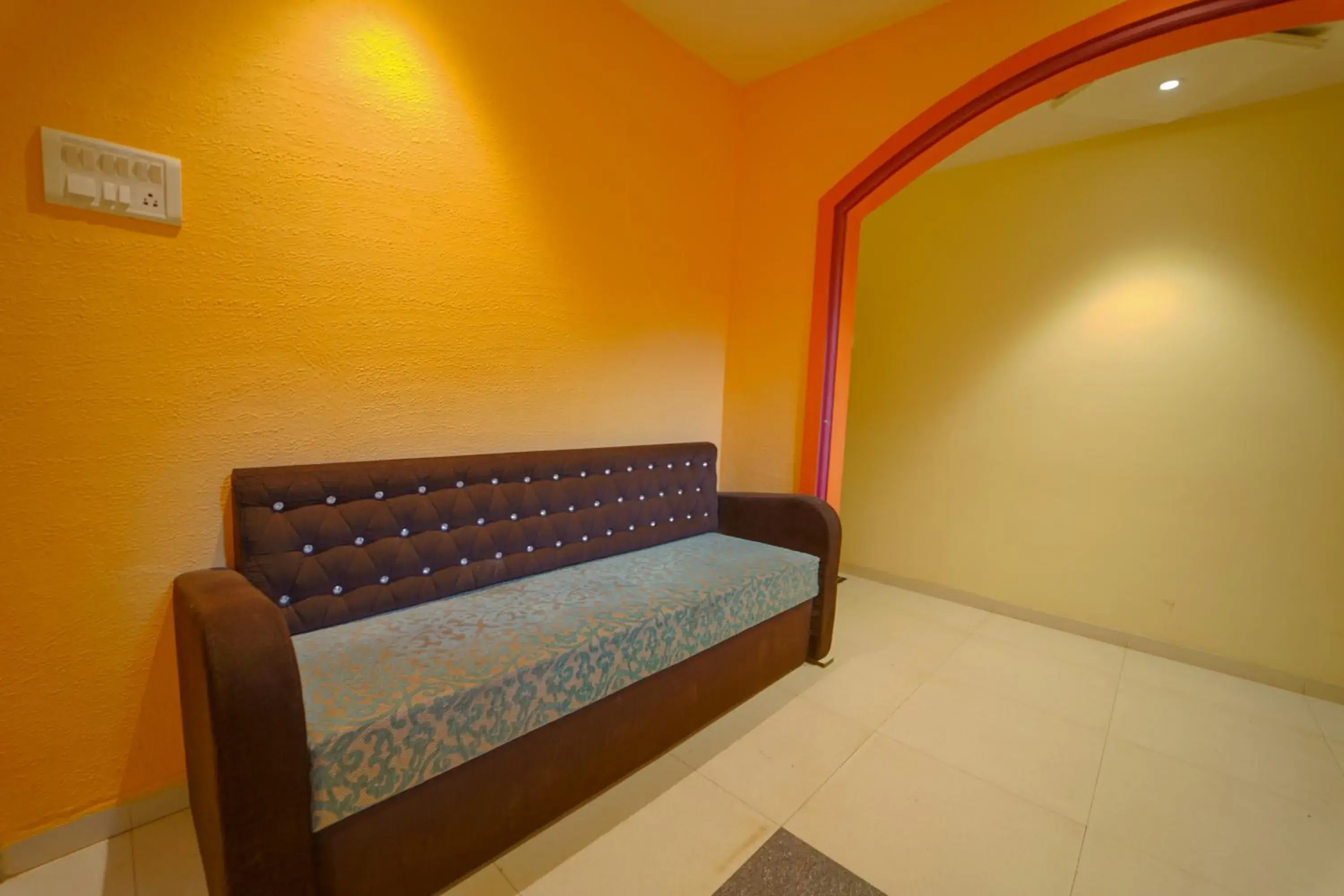 Seating area, Bed in Veggies Residency Seating area, Bed in Veggies Residency