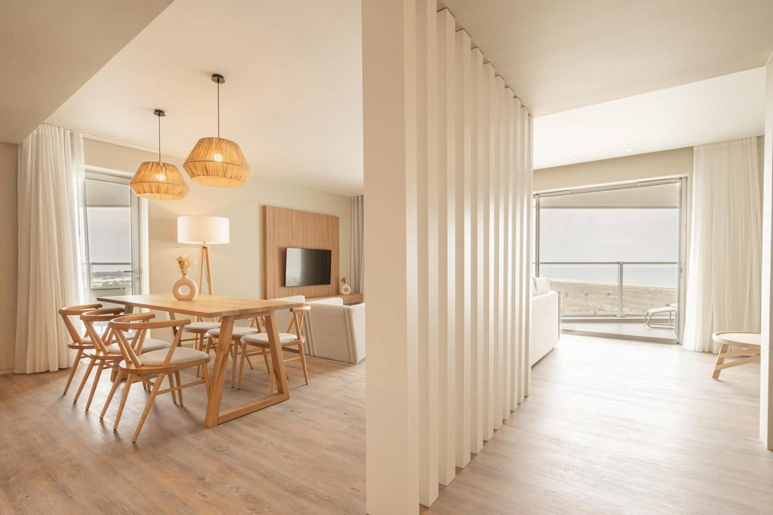 Living room in Aqualuz Troia Mar by The Editory