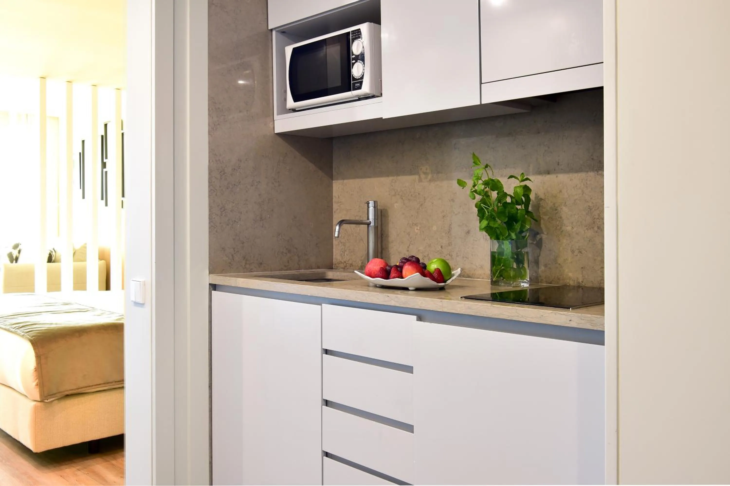Kitchen or kitchenette in Aqualuz Troia Mar by The Editory