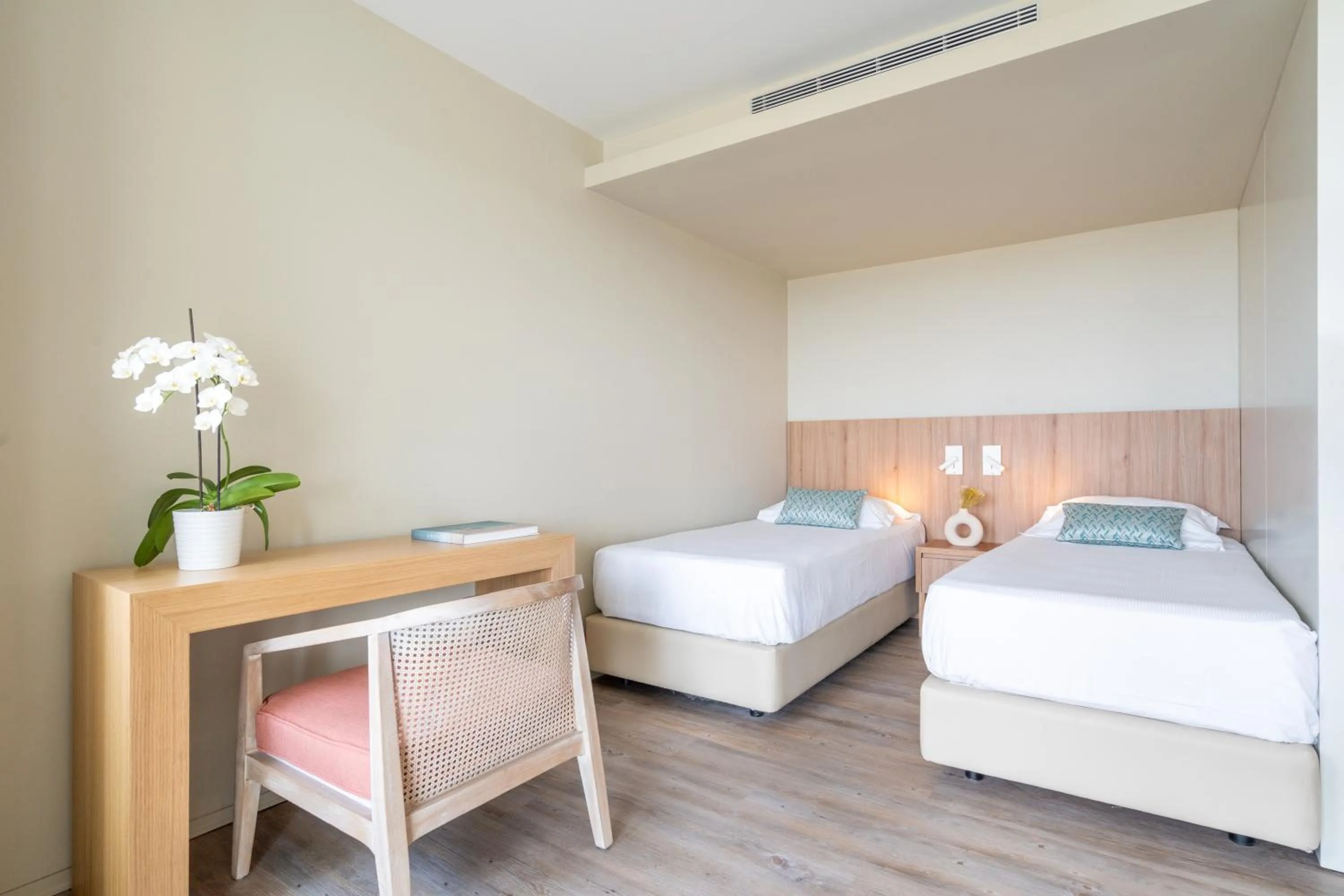 Bed in Aqualuz Troia Mar by The Editory