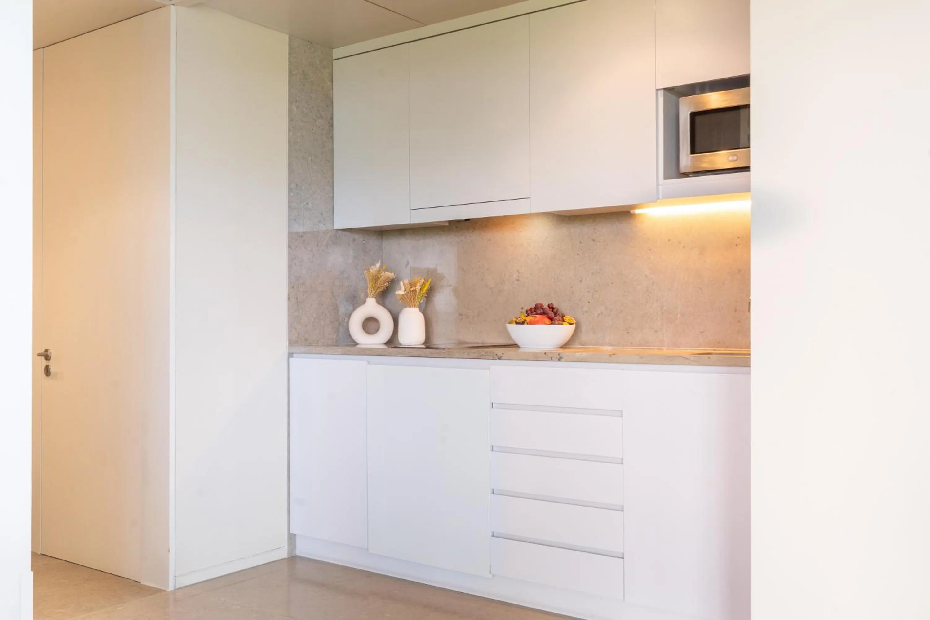 Kitchen or kitchenette in Aqualuz Troia Mar by The Editory
