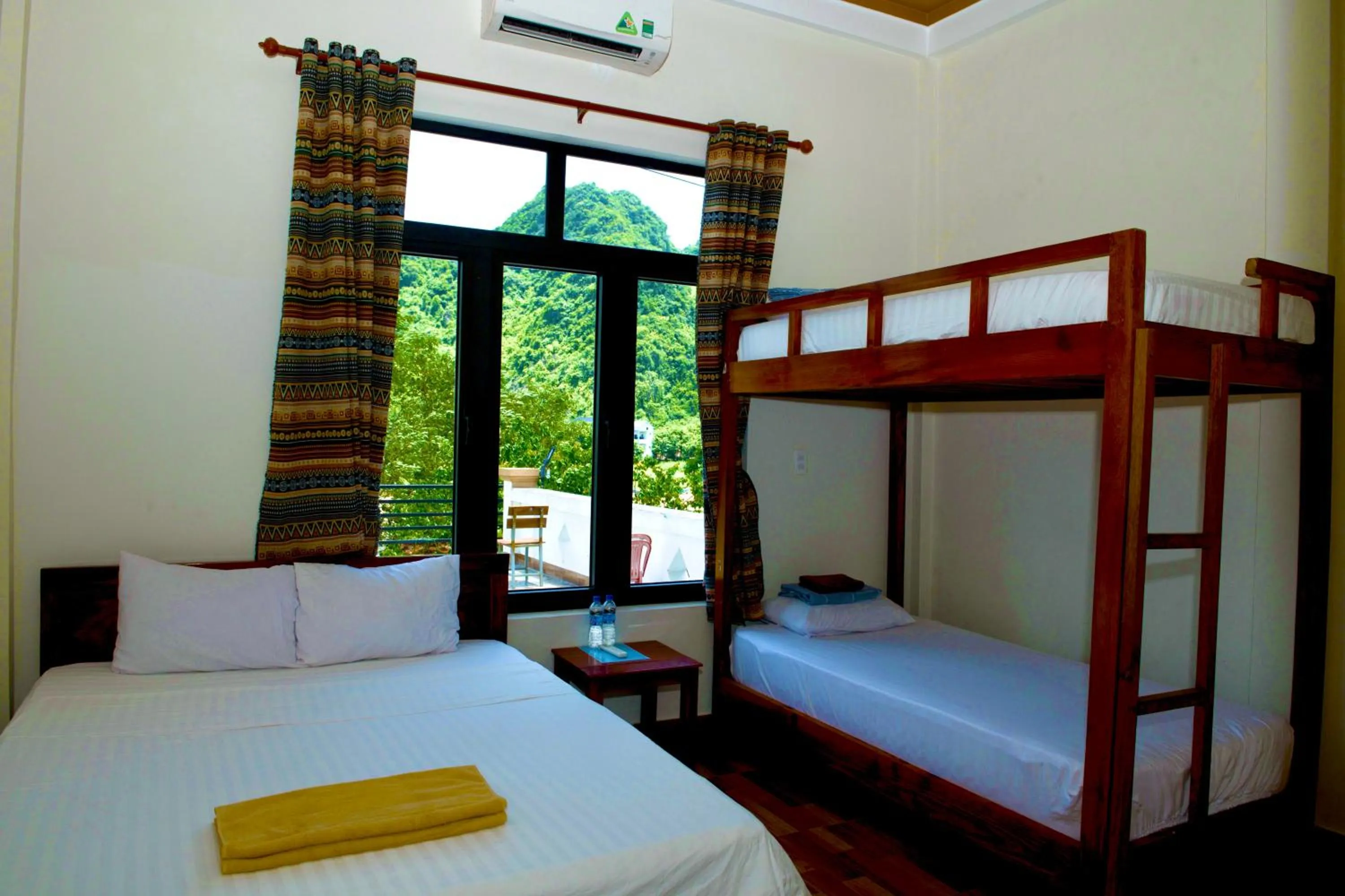 Bed in YoLo Pool Bar Villas & Garden Restaurant