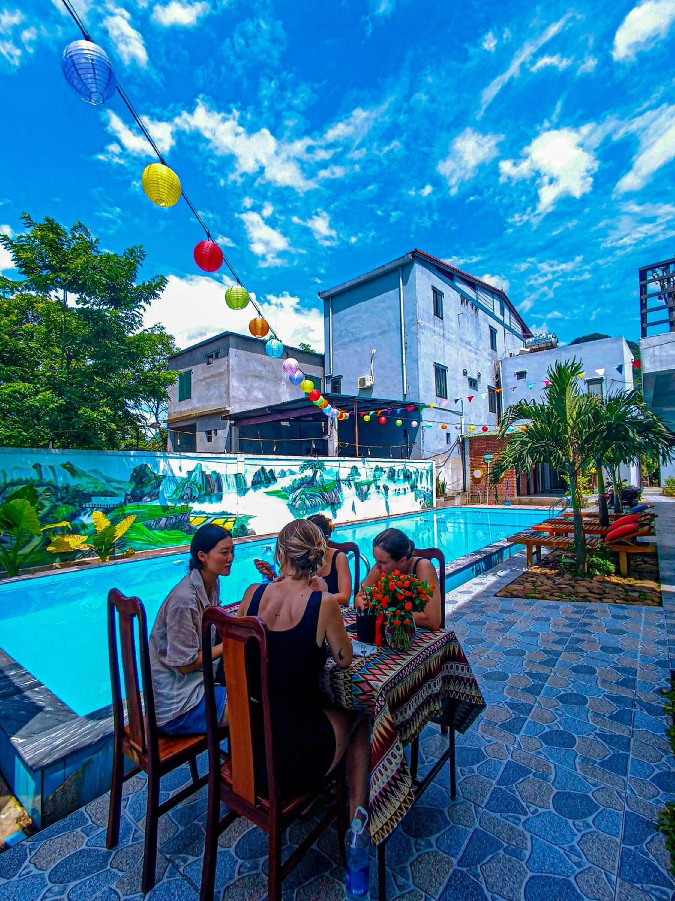 Swimming pool in YoLo Pool Bar Villas & Garden Restaurant
