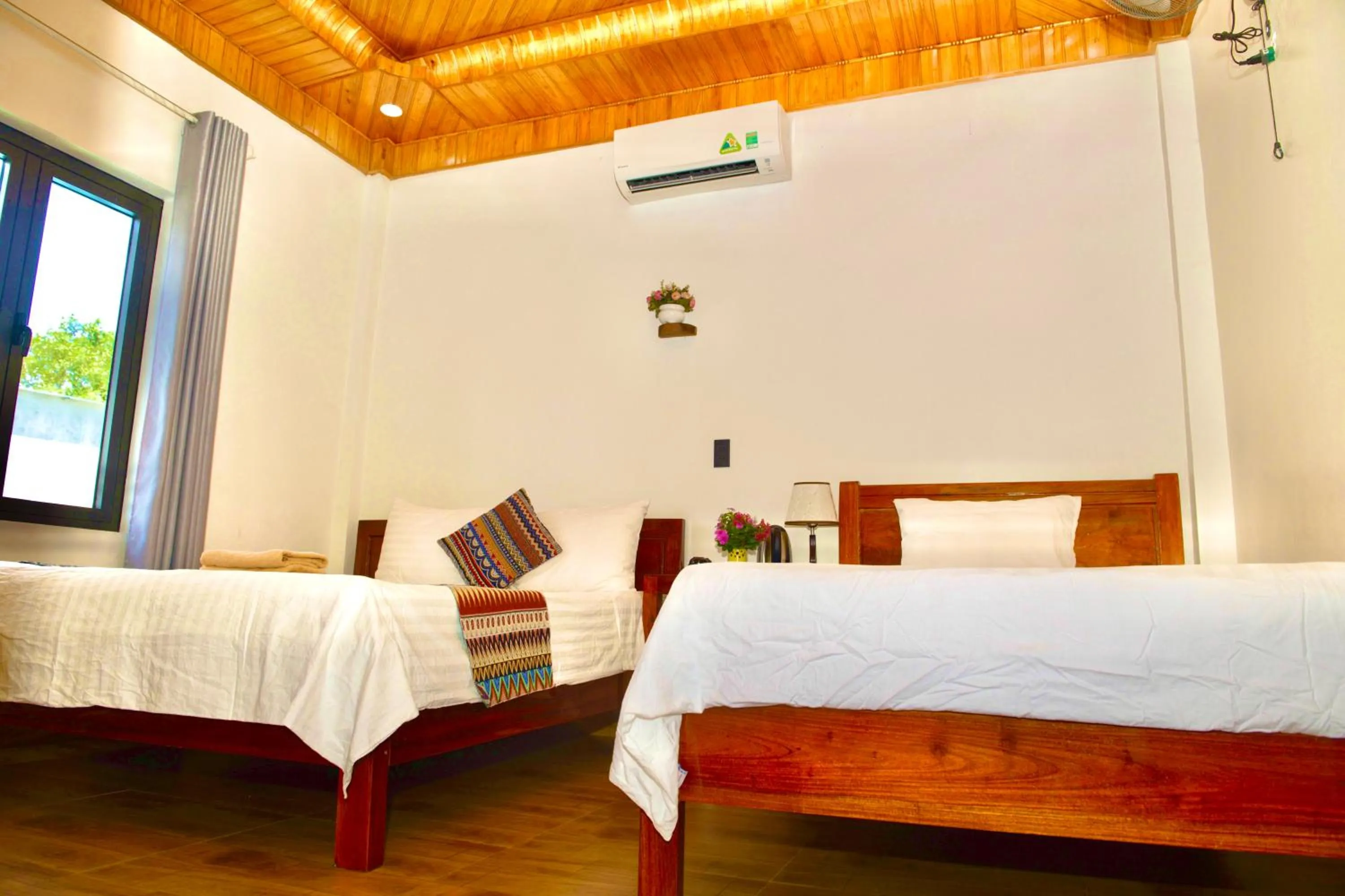 Bed in YoLo Pool Bar Villas & Garden Restaurant