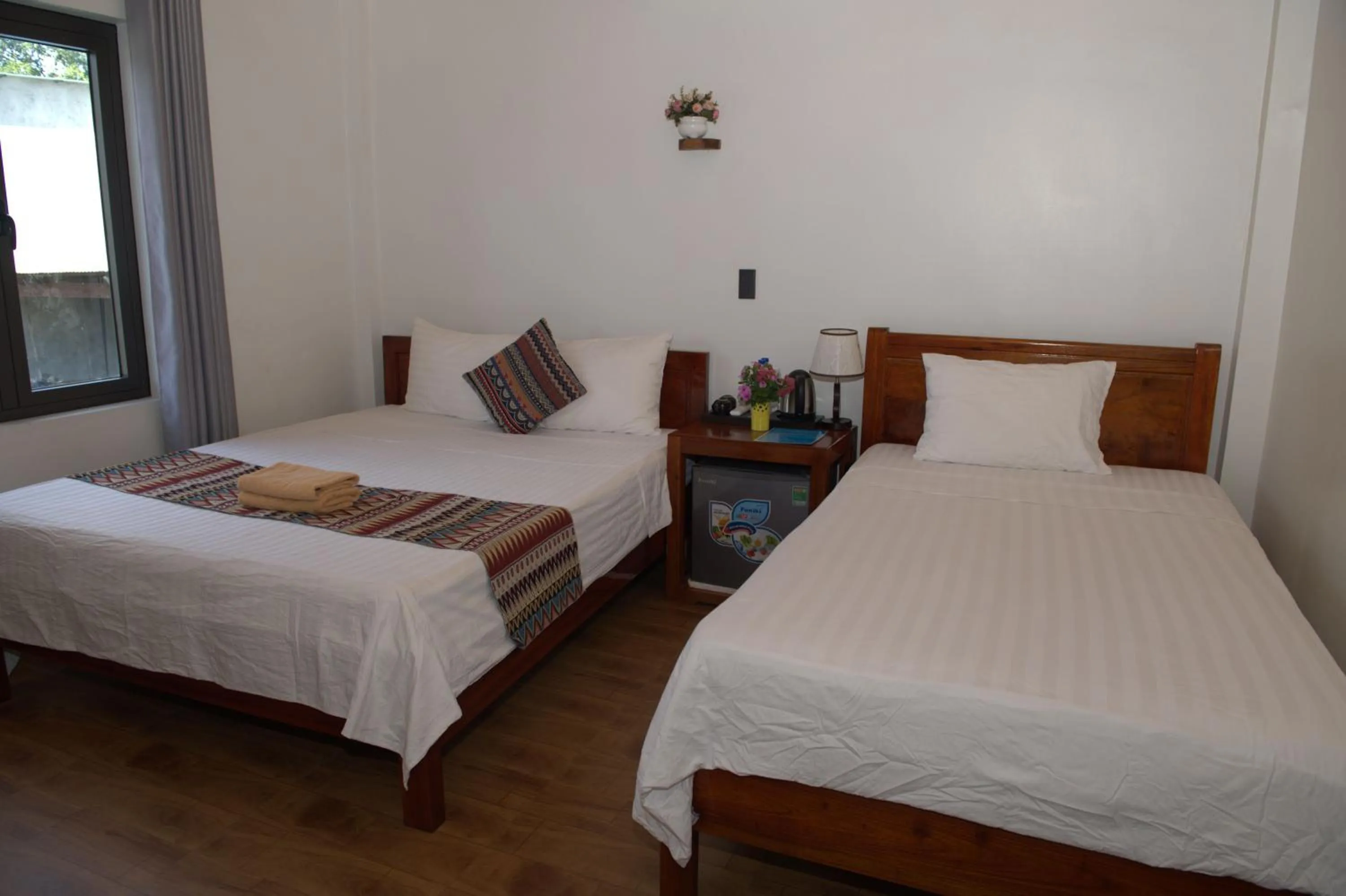 Bed in YoLo Pool Bar Villas & Garden Restaurant