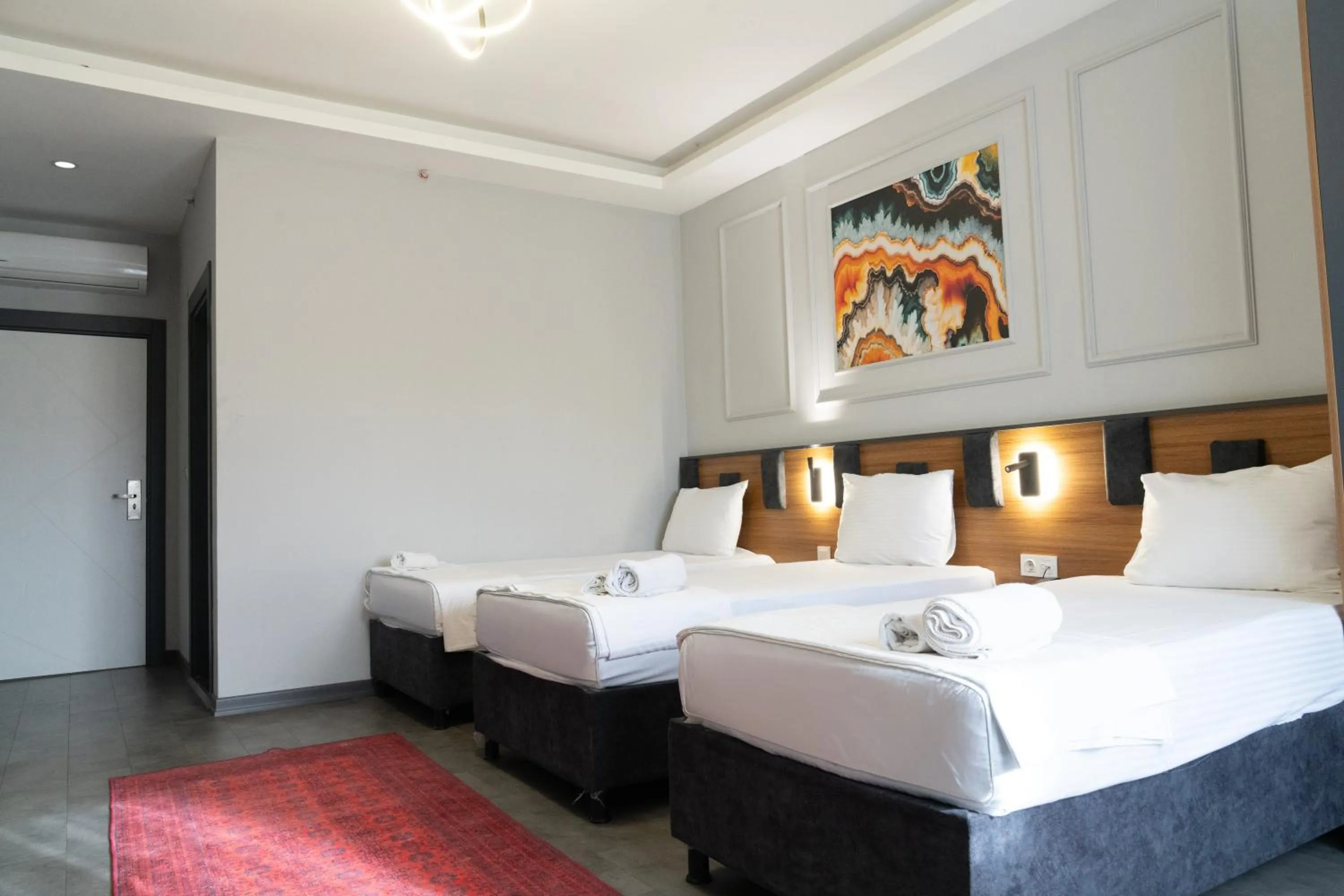 Bed in GRAND MOON HOTEL