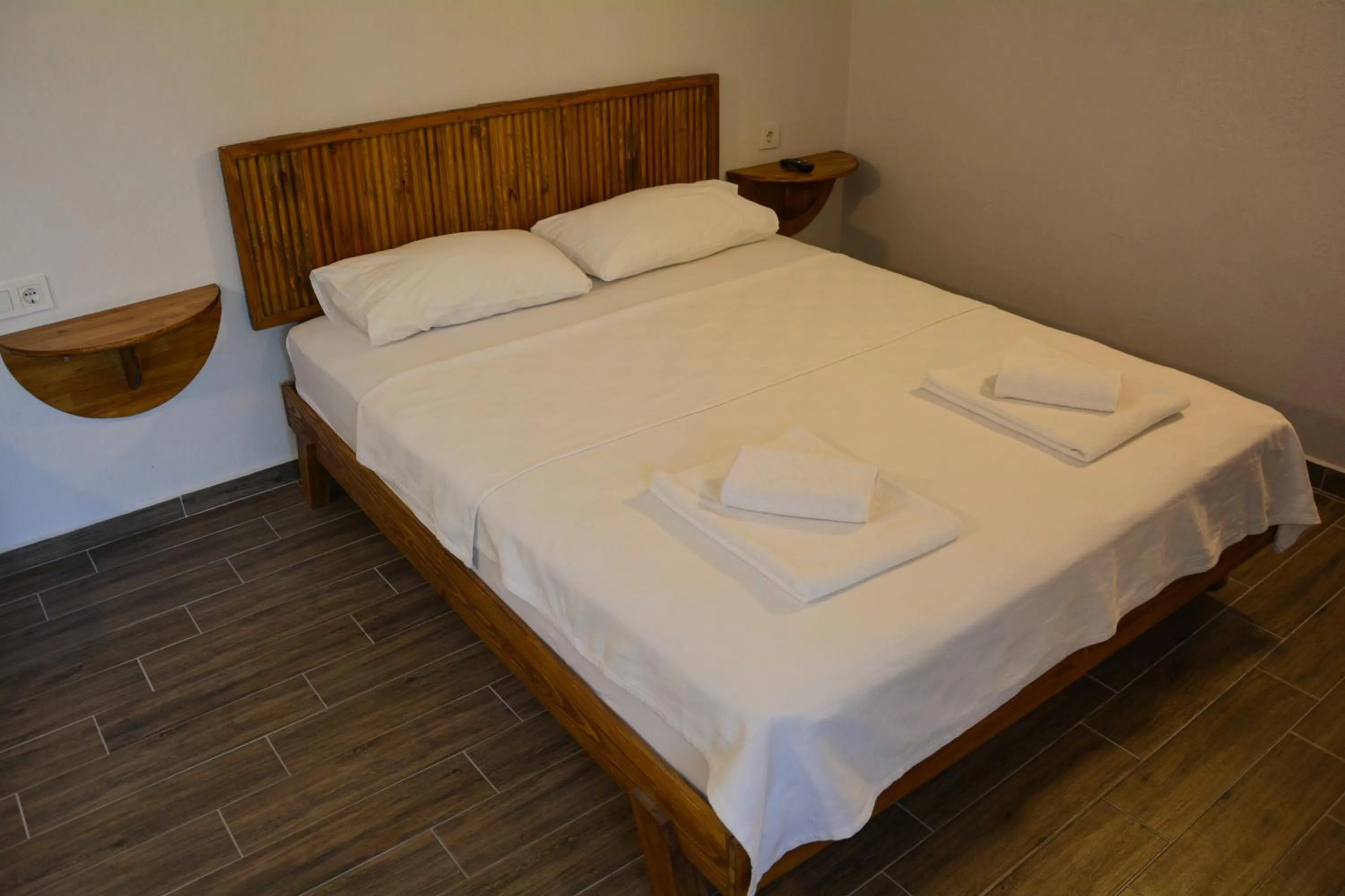 Bed in İlçayto Rooms