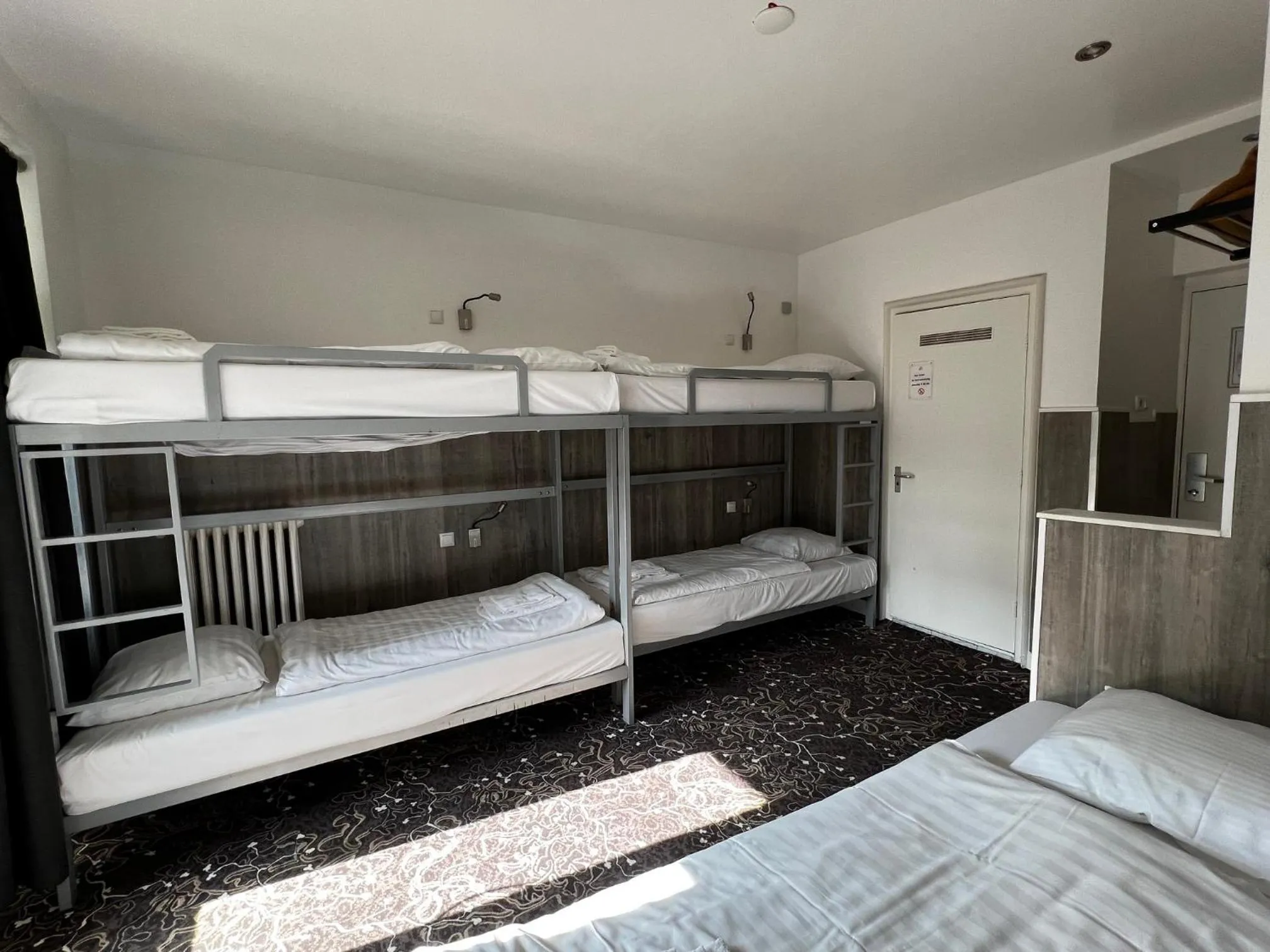 Bed in Budget Trianon Hotel