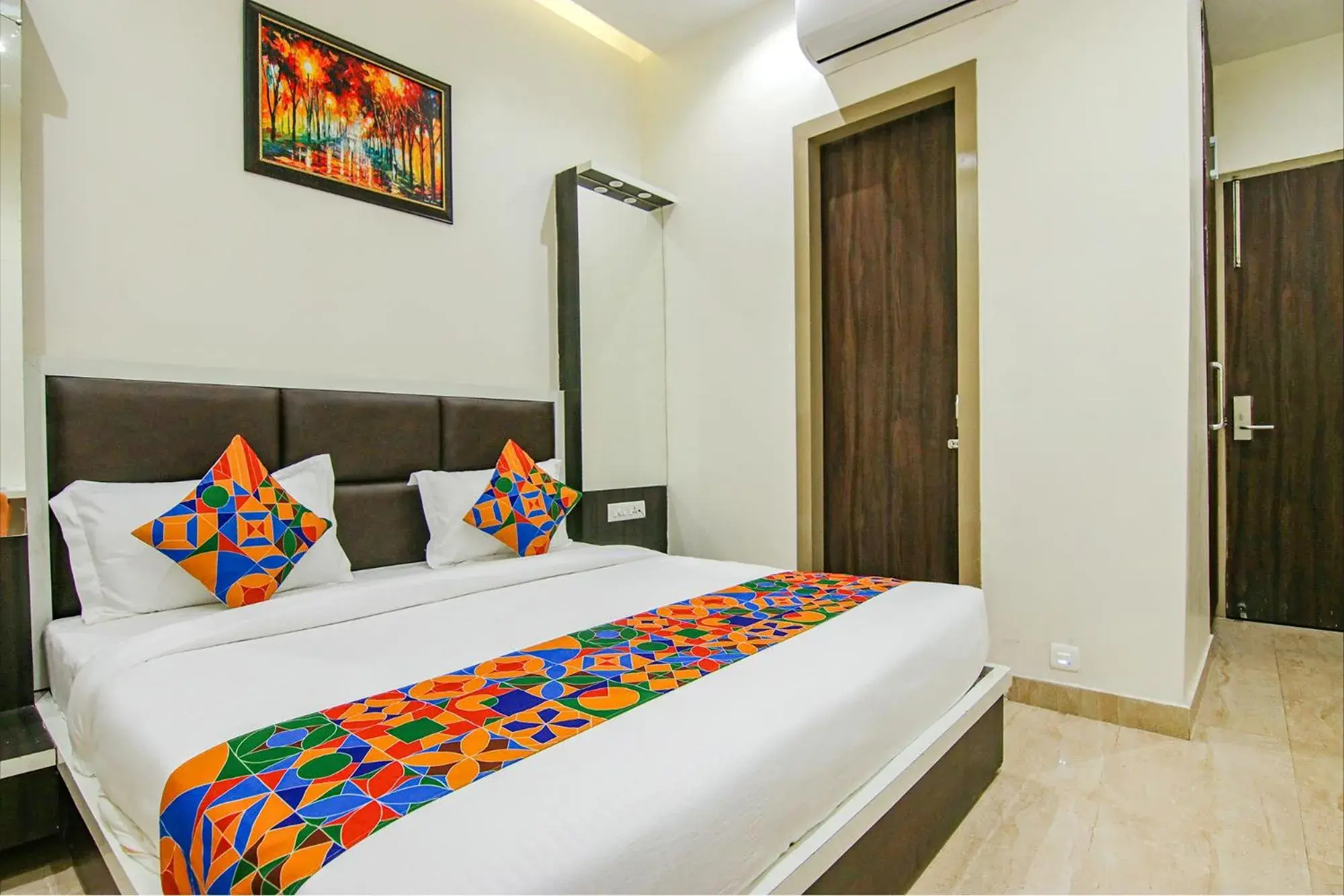 Bed in FabHotel Punjab Pride - Near Golden temple Bed in FabHotel Punjab Pride - Near Golden temple