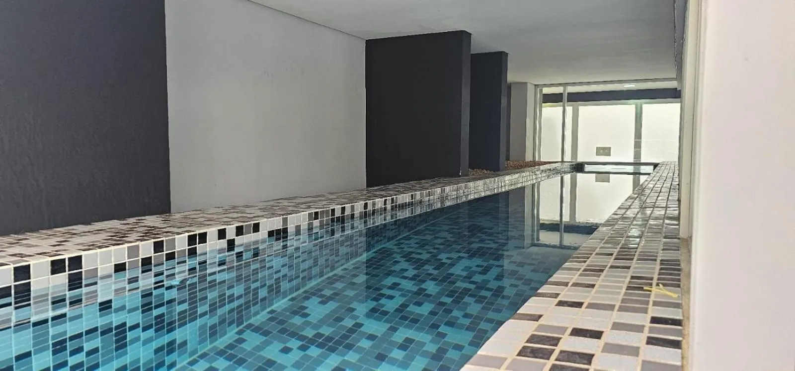 Swimming pool in Loft Completo com Cozinha - Quatá - Vila Olímpia
