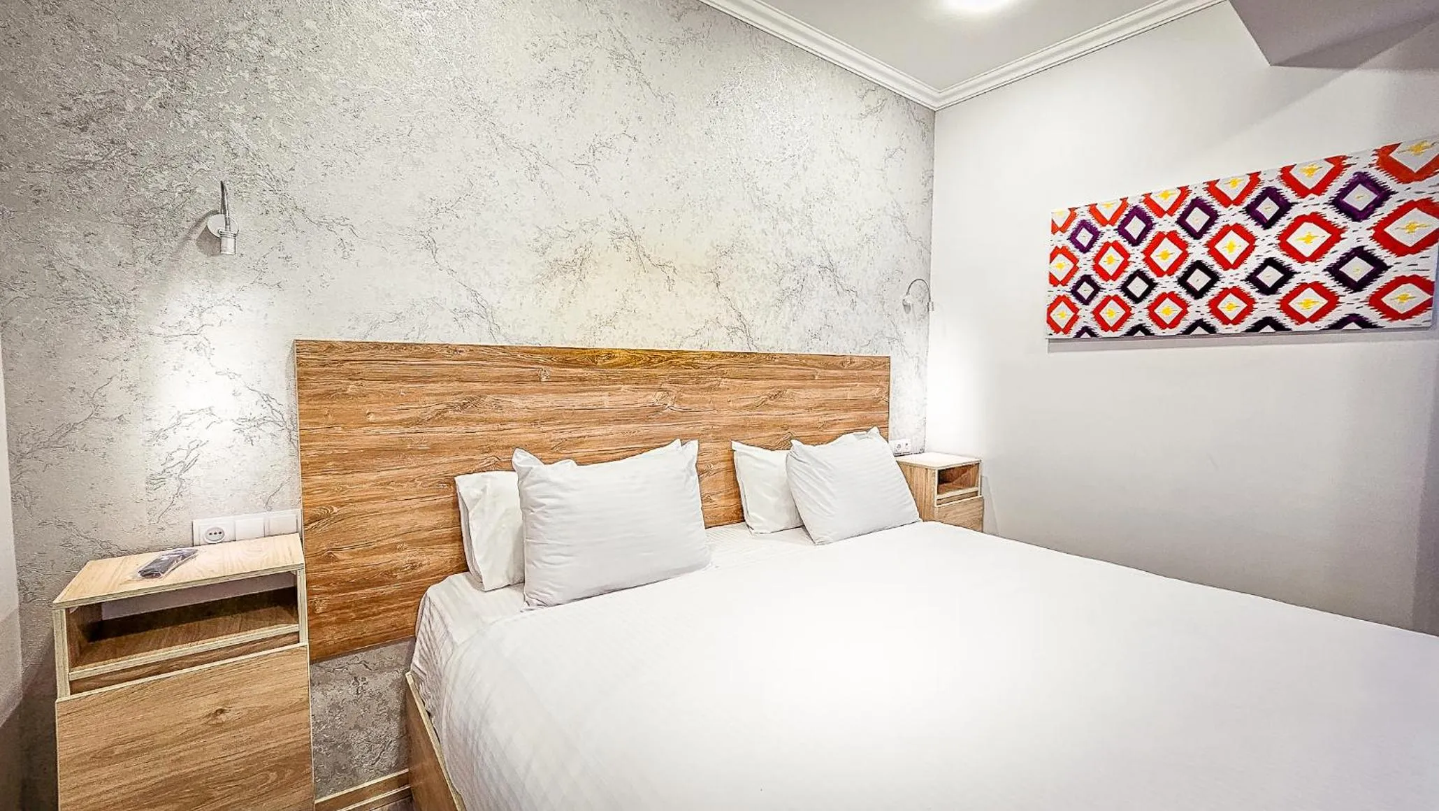 Bed in Hotel Bankir Khiva