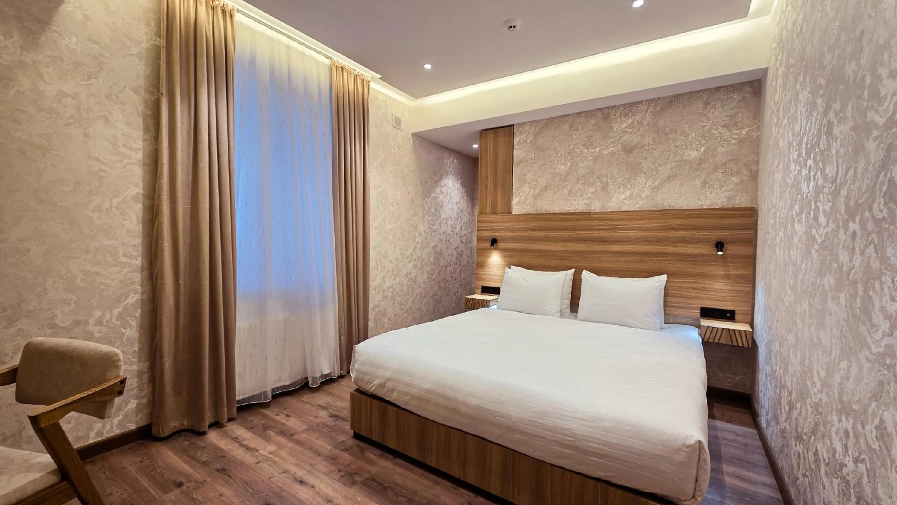 Bed in Hotel Bankir Khiva