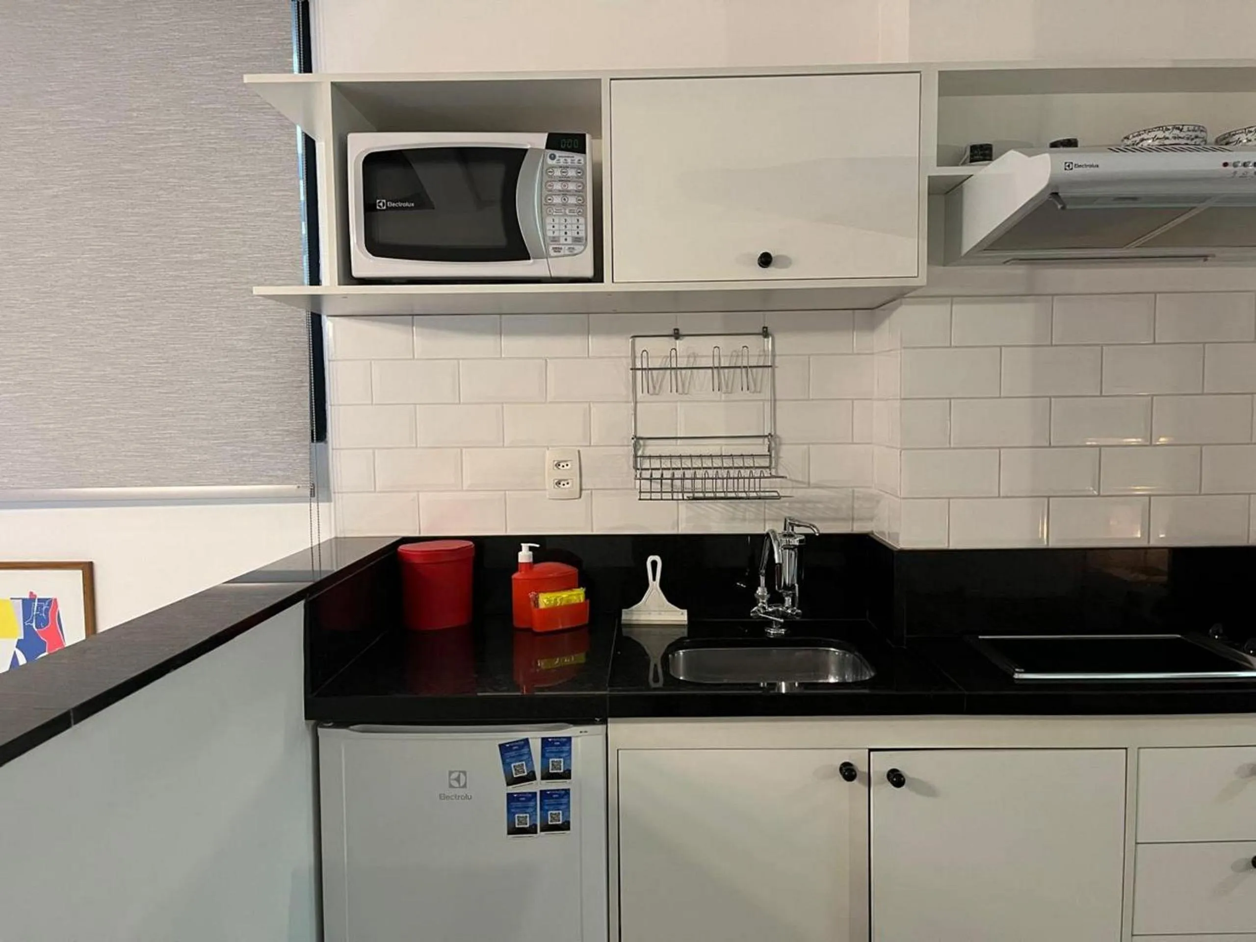 Kitchen or kitchenette in Elegance Suítes Carvalho