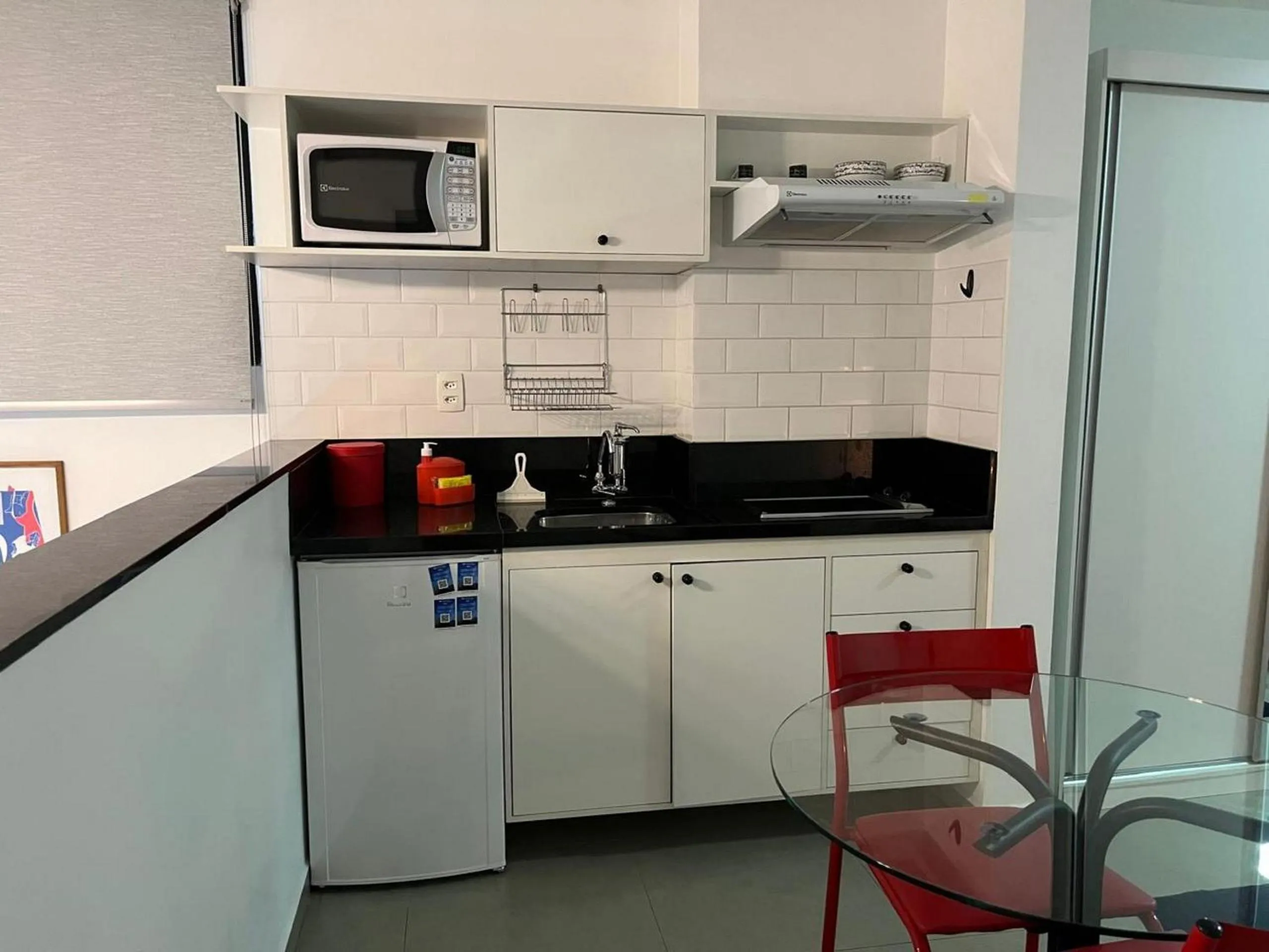 Kitchen or kitchenette in Elegance Suítes Carvalho