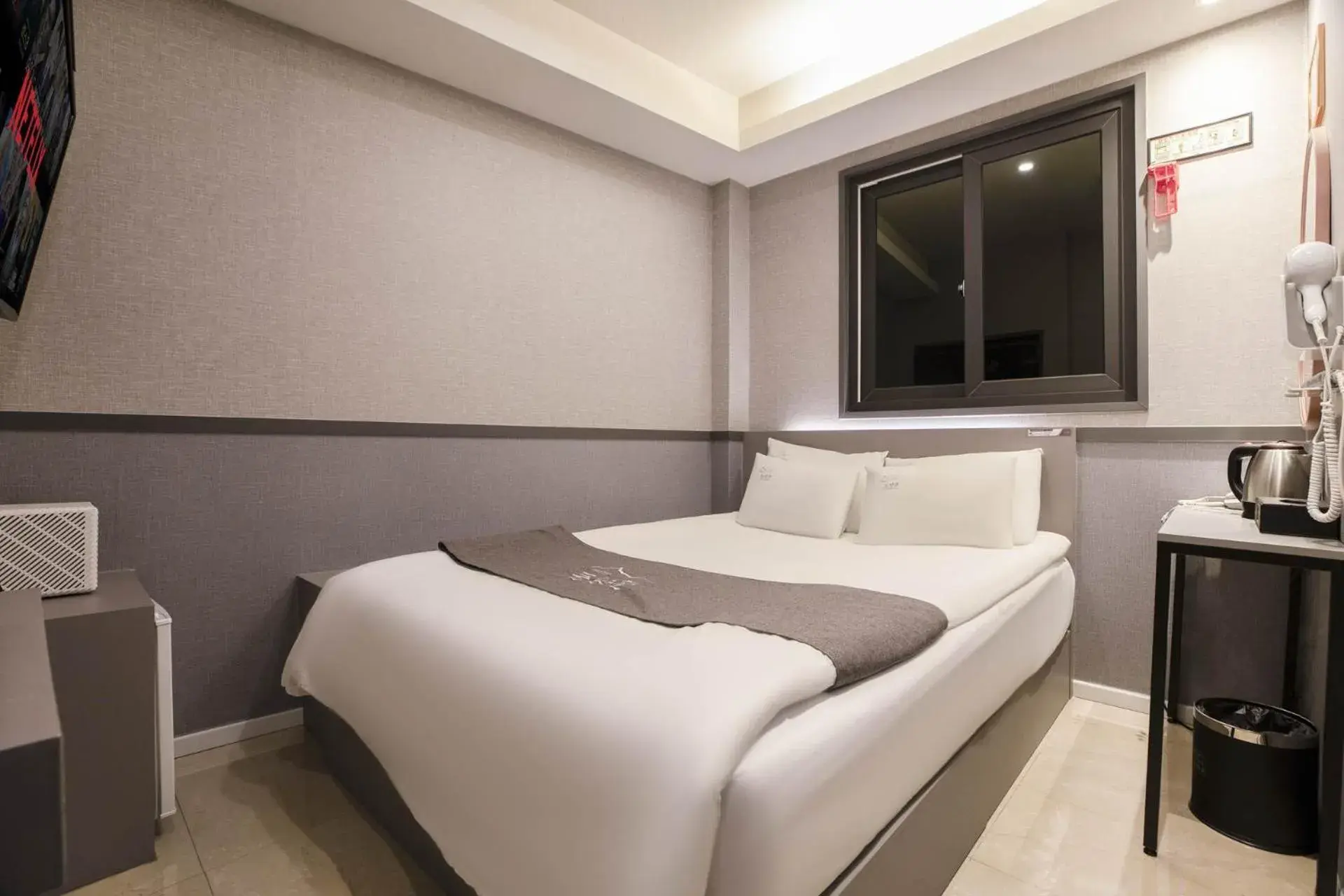 Bed in Hotel dongyangjang Dongdaemun-Jongno Bed in Hotel dongyangjang Dongdaemun-Jongno