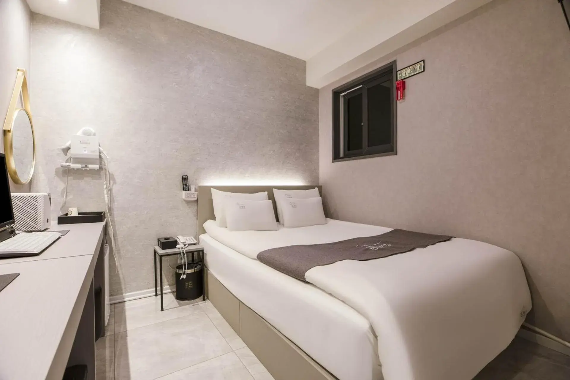 Bed in Hotel dongyangjang Dongdaemun-Jongno Bed in Hotel dongyangjang Dongdaemun-Jongno