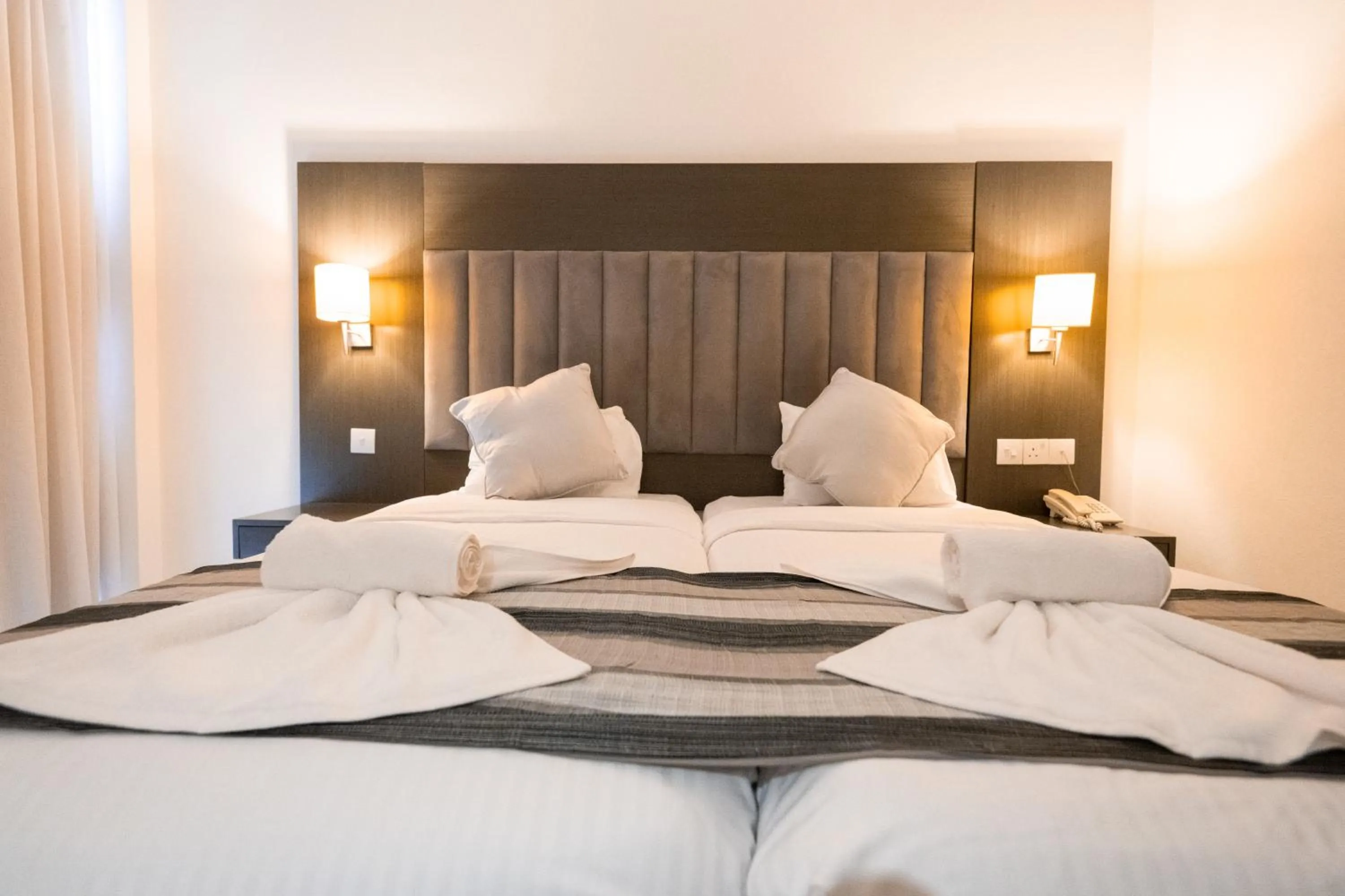 Bed in Napa Jay Hotel