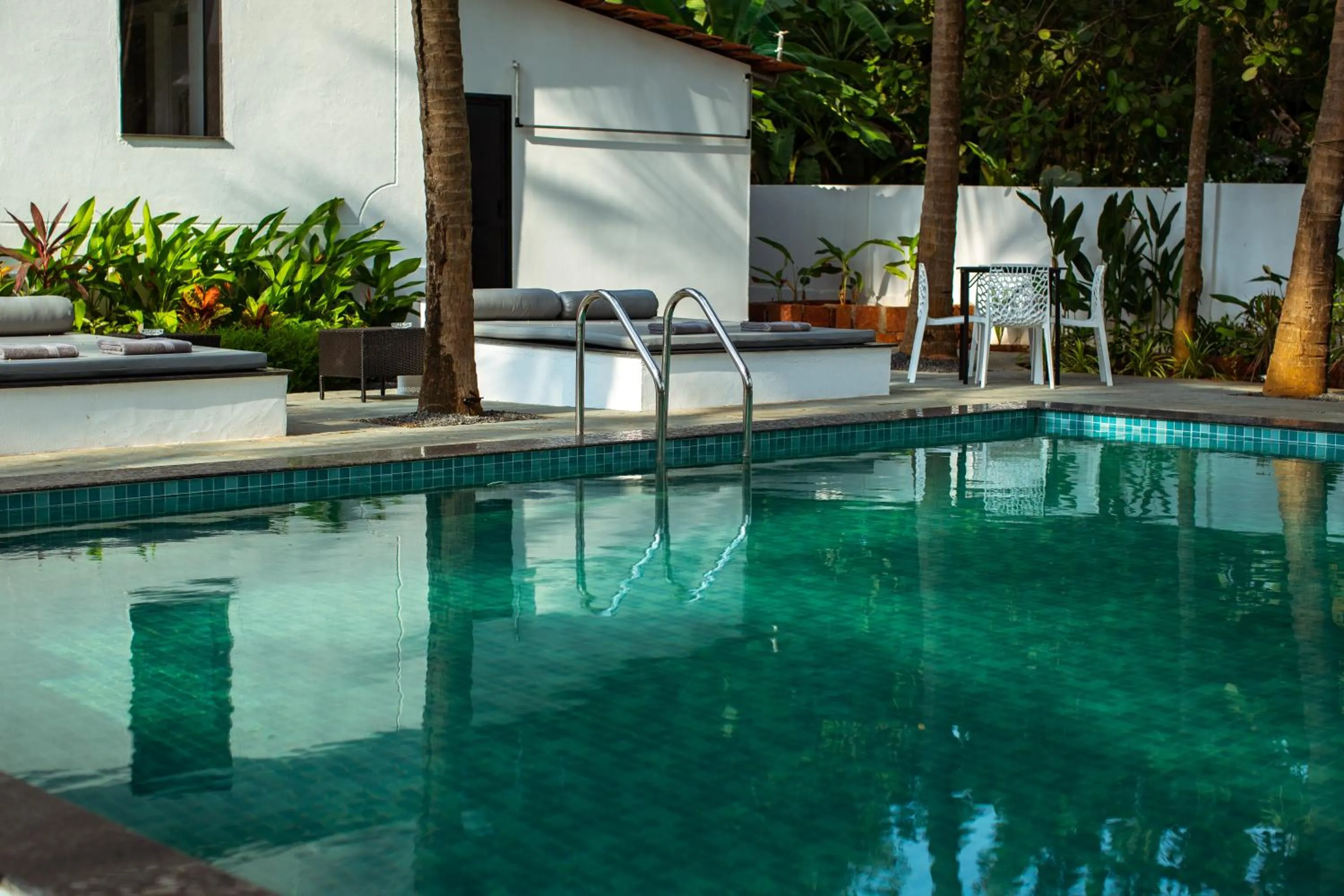Swimming pool in Pont Bleu Suites Riverside & Pool