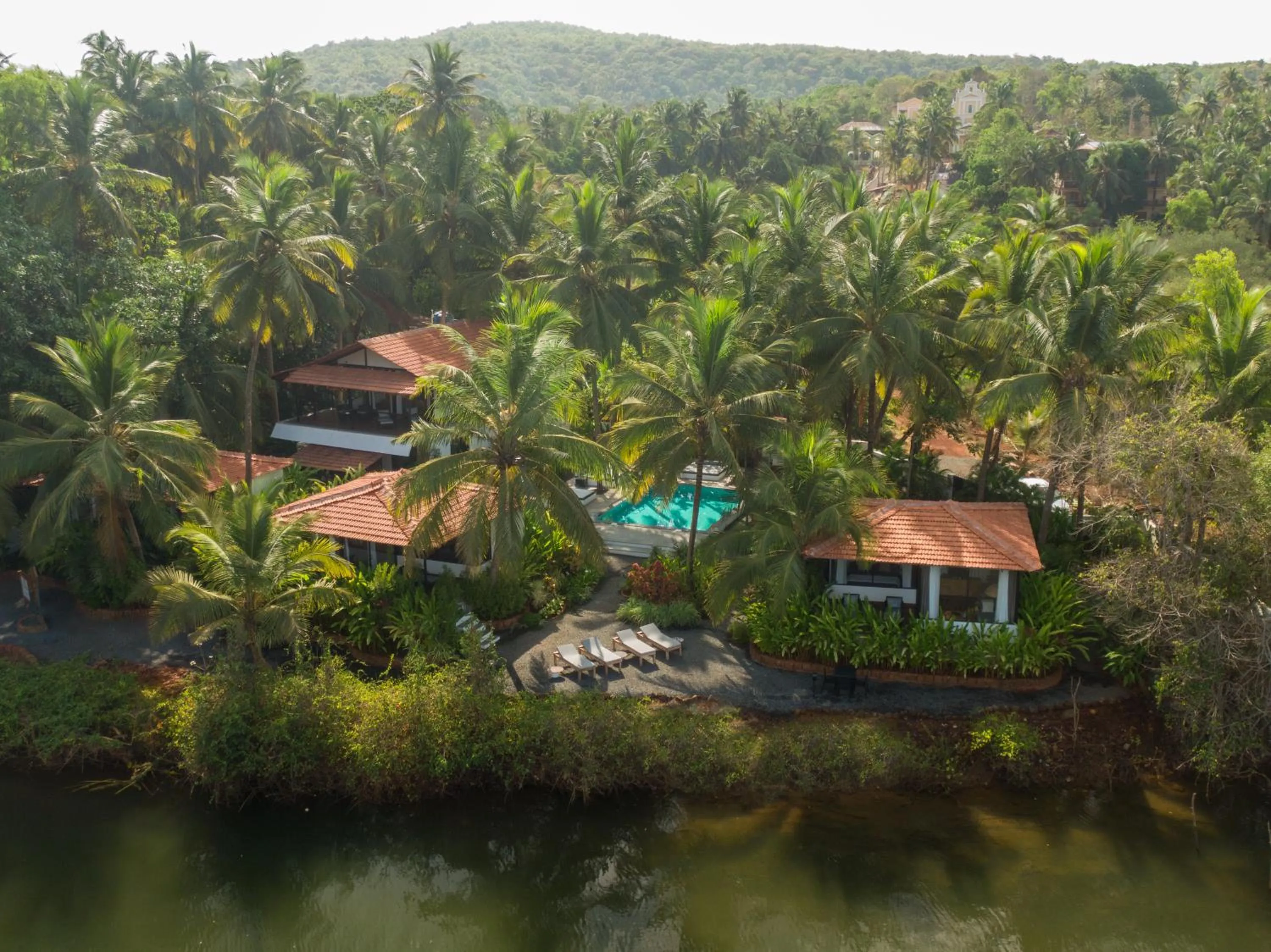 Property building in Pont Bleu Suites Riverside & Pool