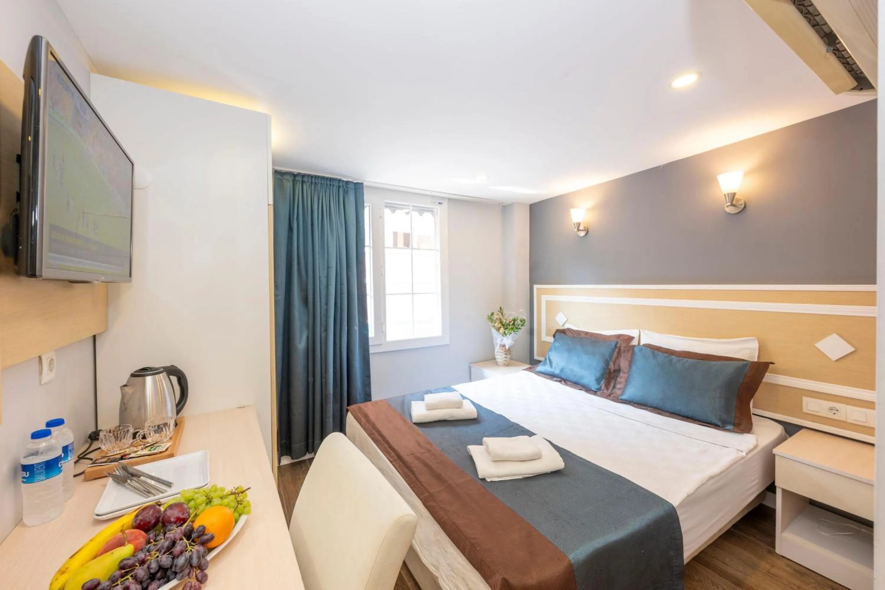 Bed in LEGEND TULIP HOTEL