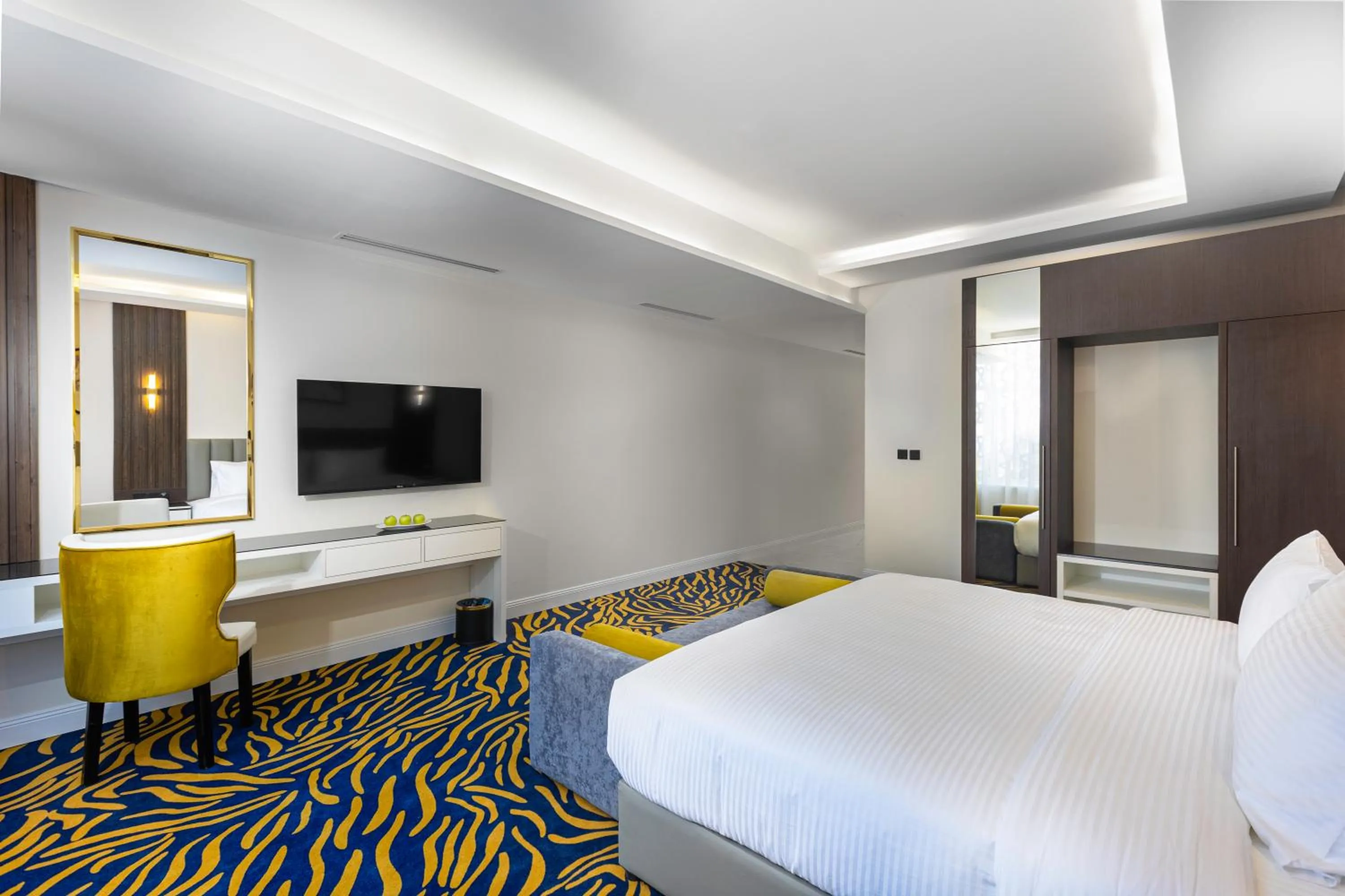 Communal lounge/ TV room, Bed in Jasmien Golden Hotel