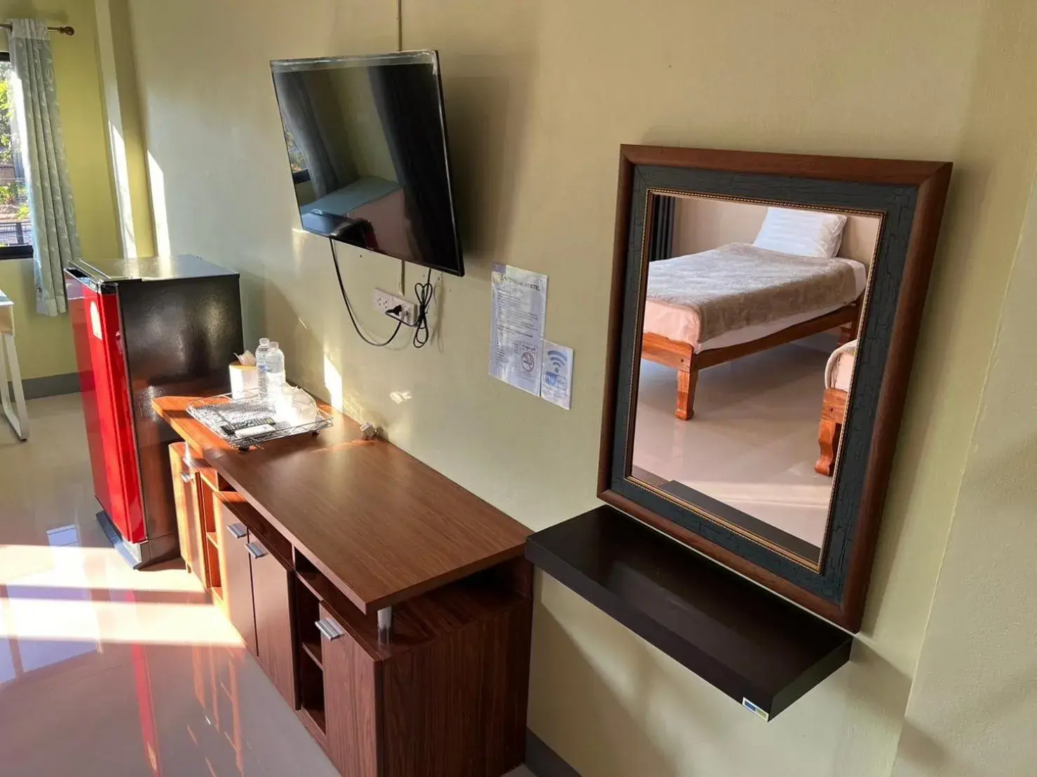 Bed in V Tharm Hotel Bed in V Tharm Hotel