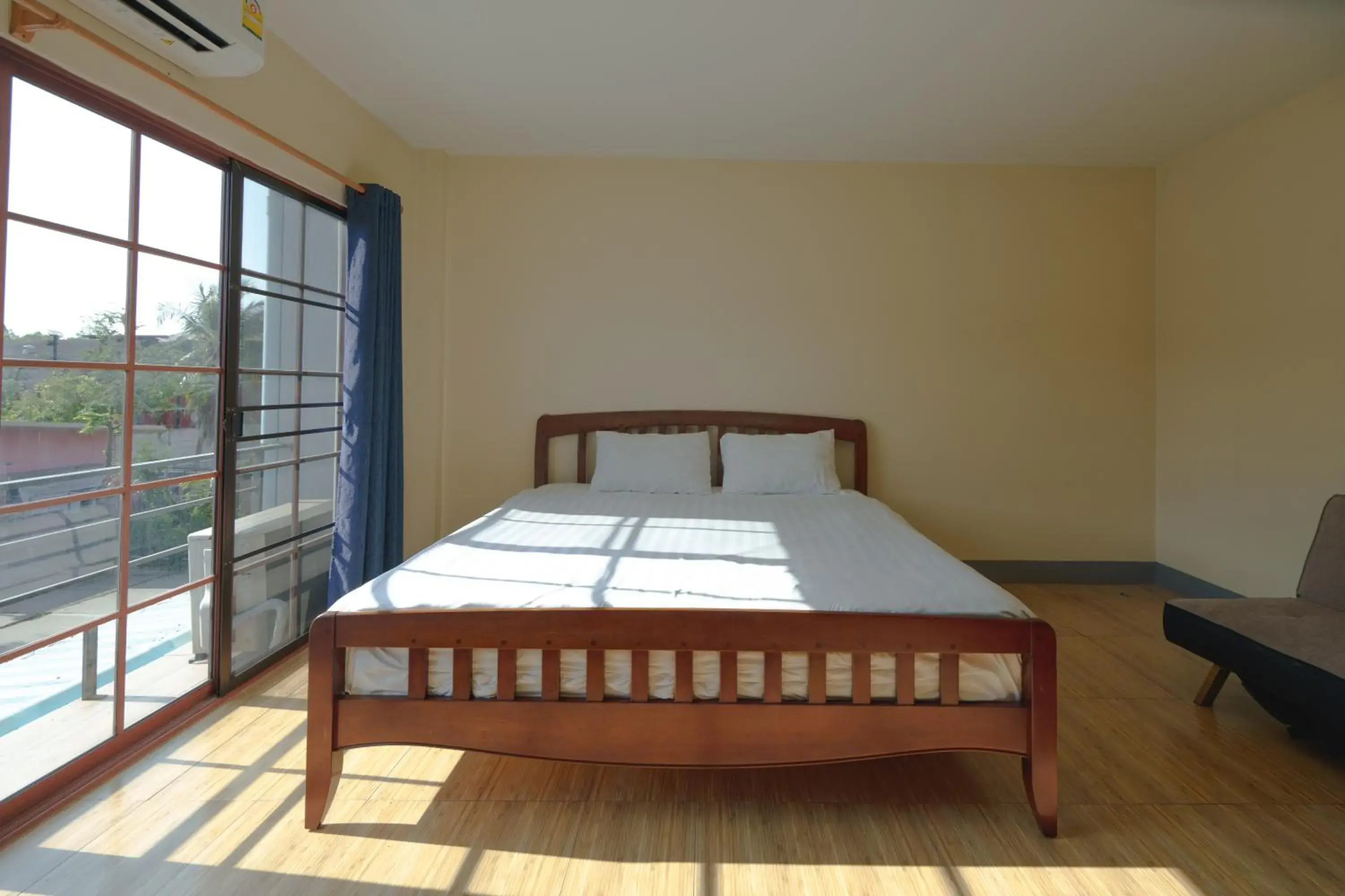 Bed in V Tharm Hotel Bed in V Tharm Hotel