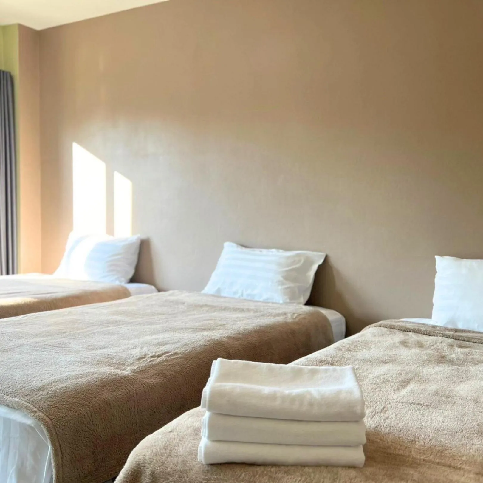 Bed in V Tharm Hotel