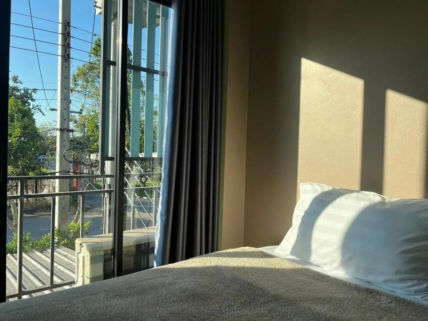 Bed in V Tharm Hotel Bed in V Tharm Hotel