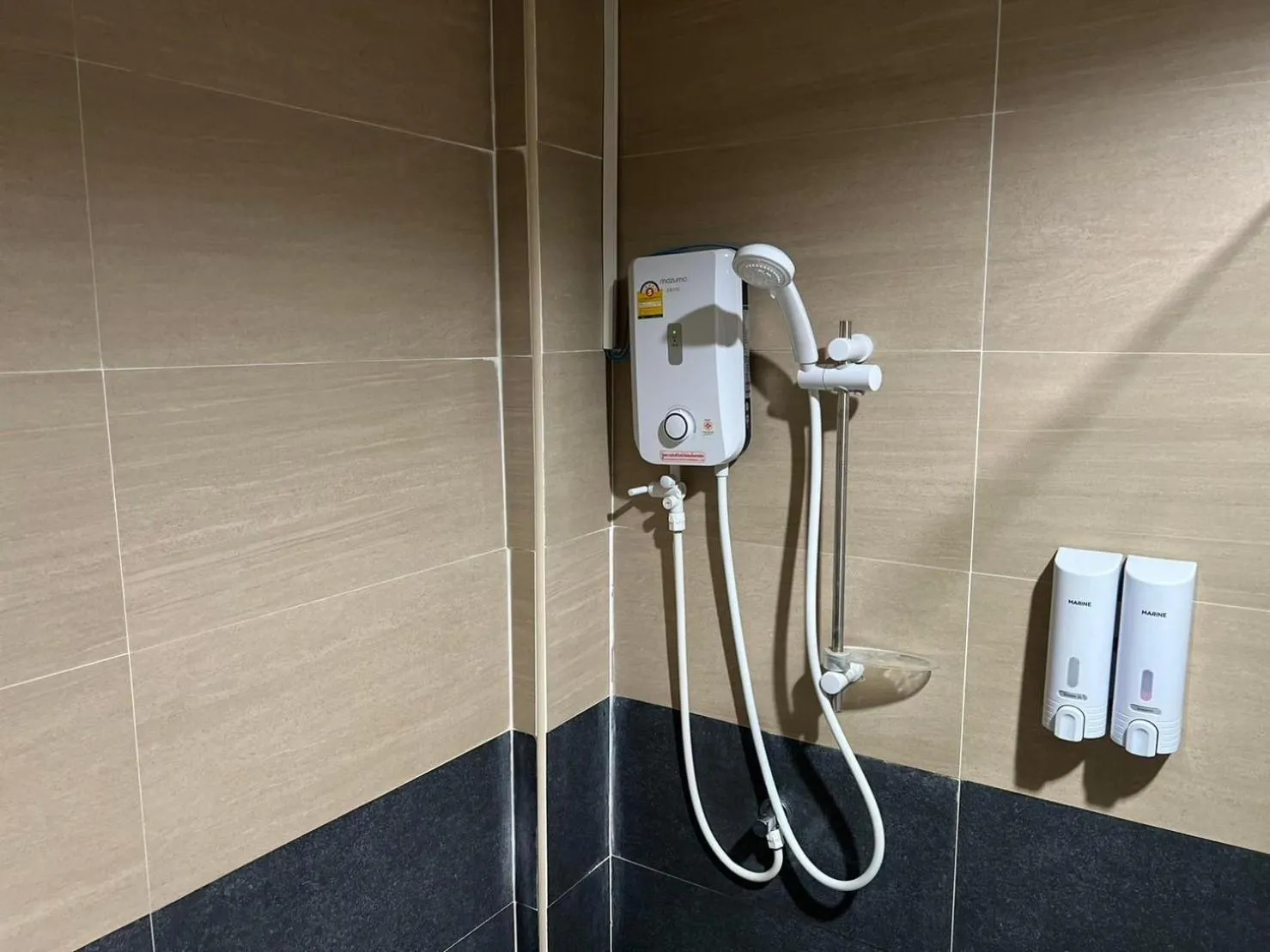 Shower in V Tharm Hotel