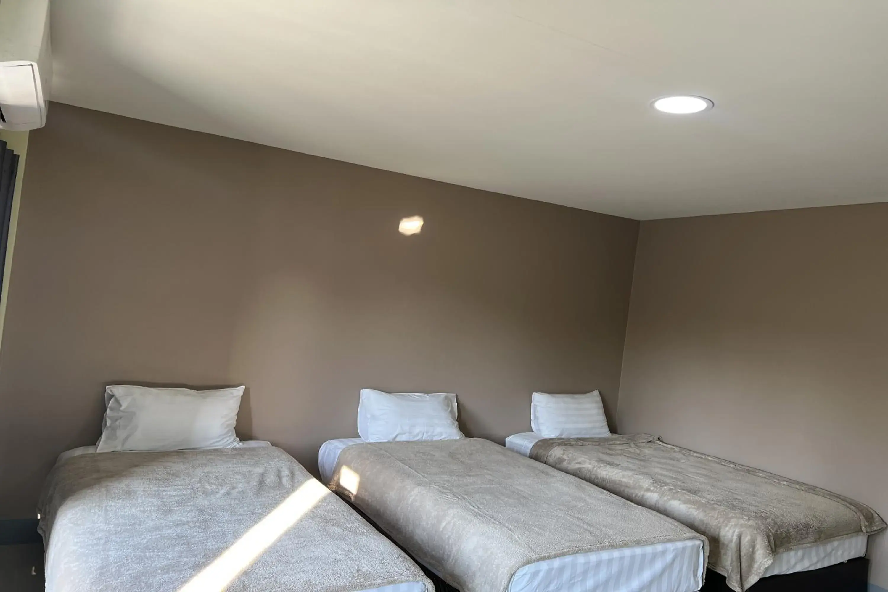 Bed in V Tharm Hotel Bed in V Tharm Hotel