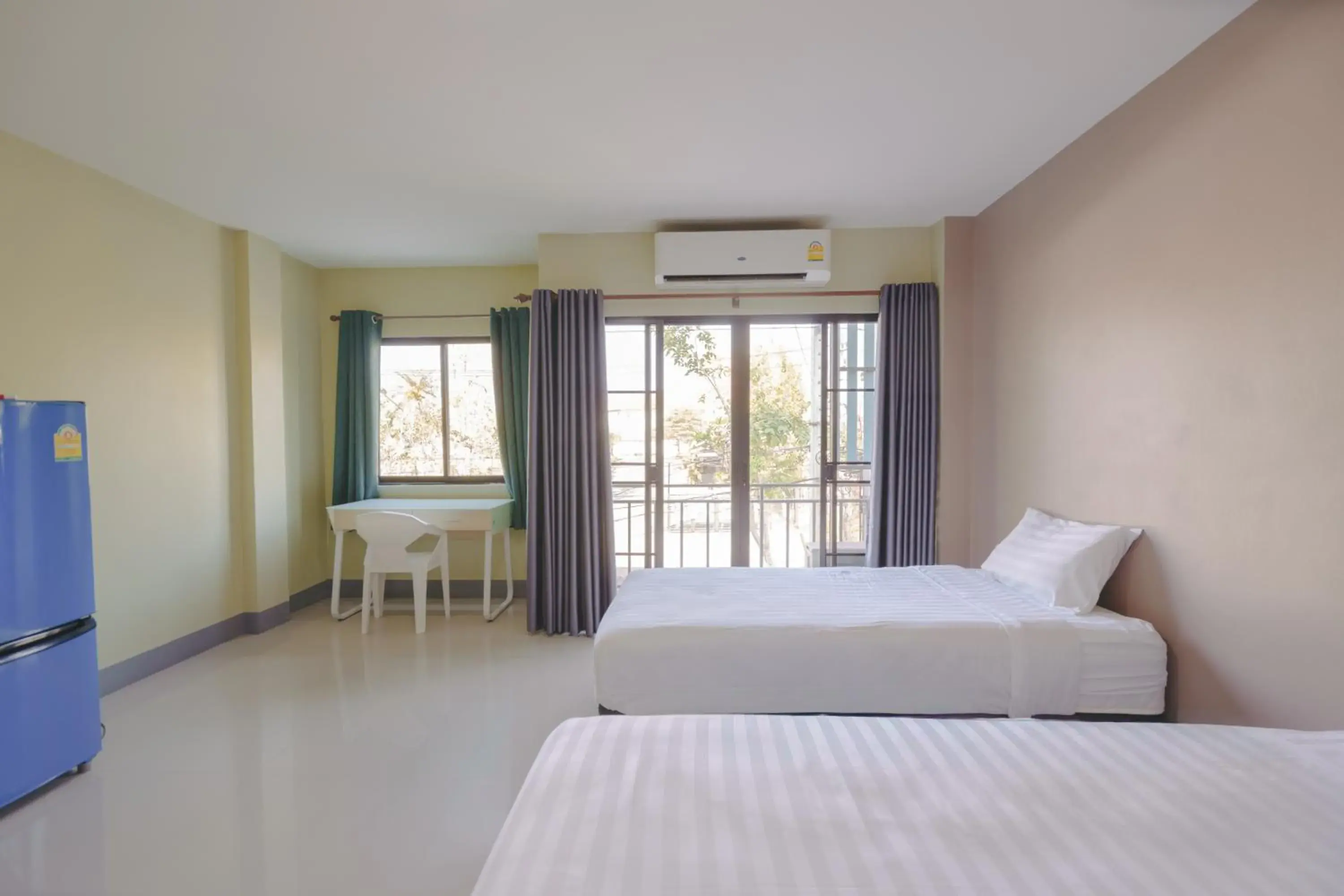 Bed in V Tharm Hotel Bed in V Tharm Hotel