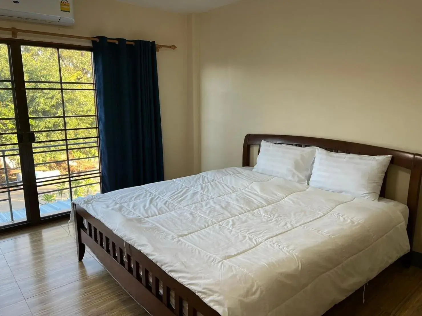 Bed in V Tharm Hotel Bed in V Tharm Hotel