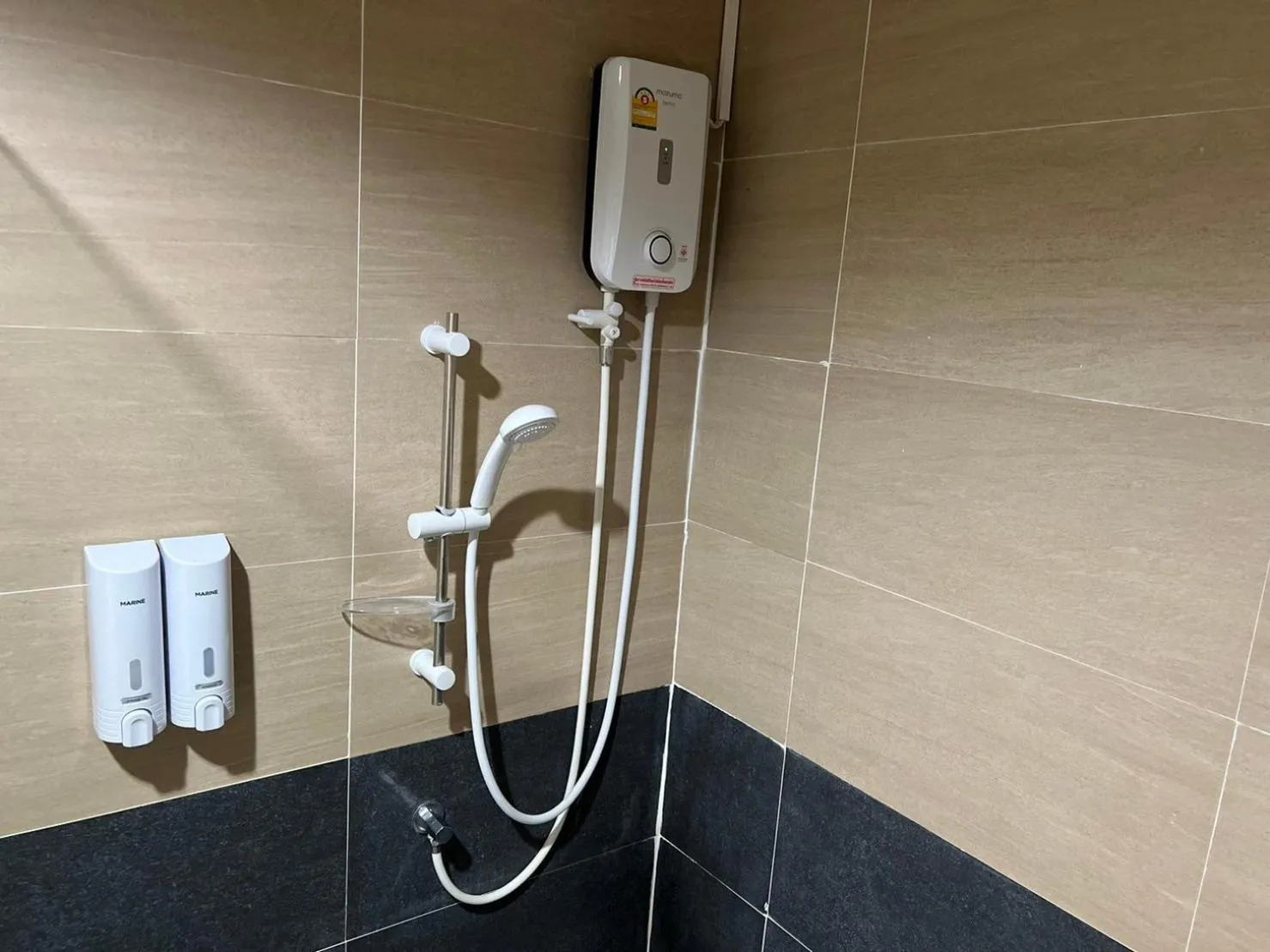 Shower in V Tharm Hotel