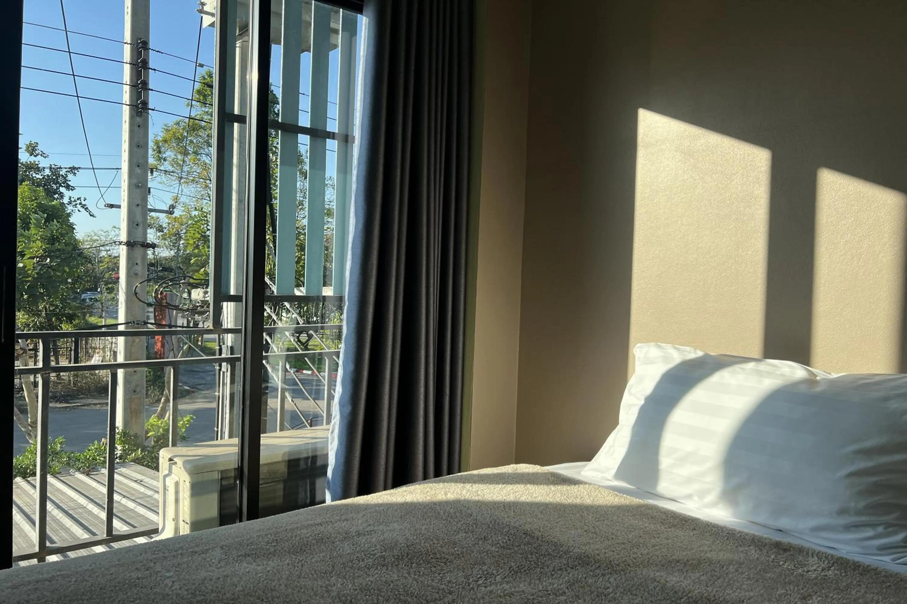 Bed in V Tharm Hotel