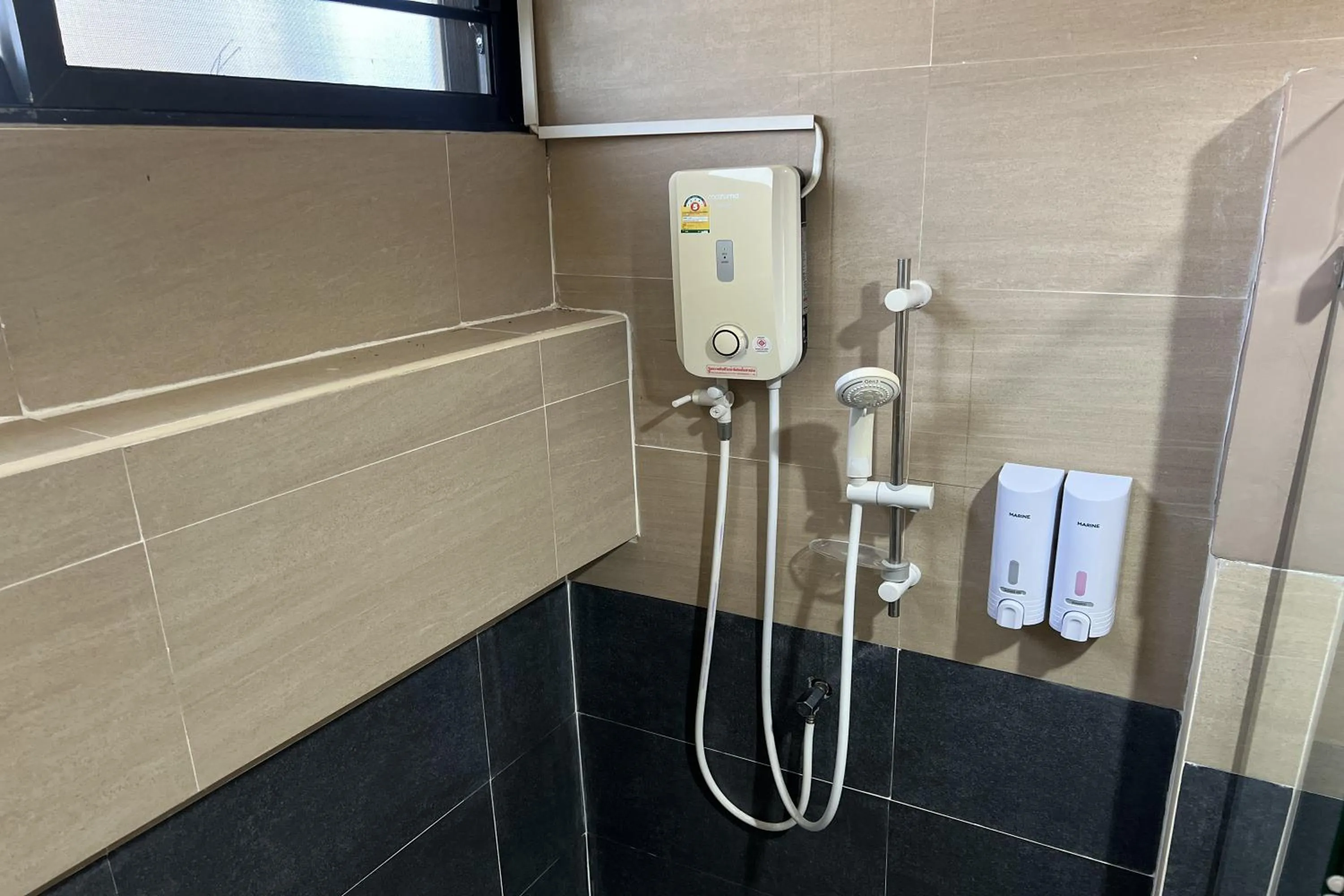 Shower in V Tharm Hotel