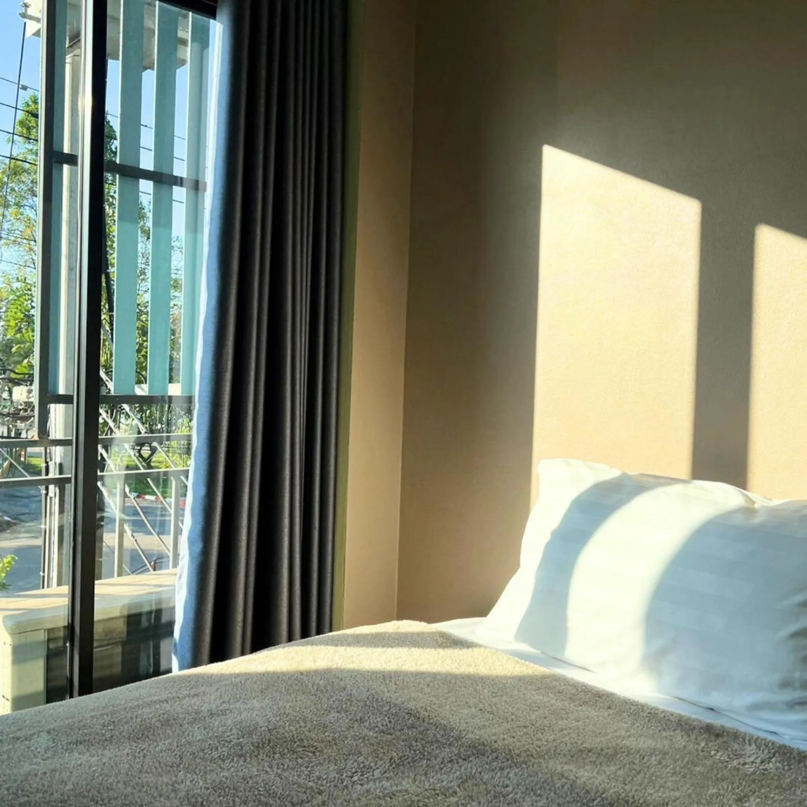 Bed in V Tharm Hotel