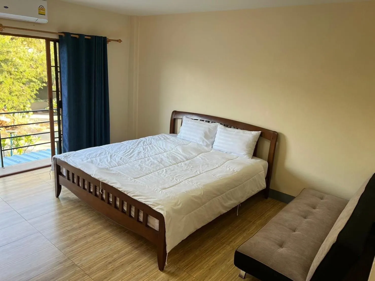 Bed in V Tharm Hotel