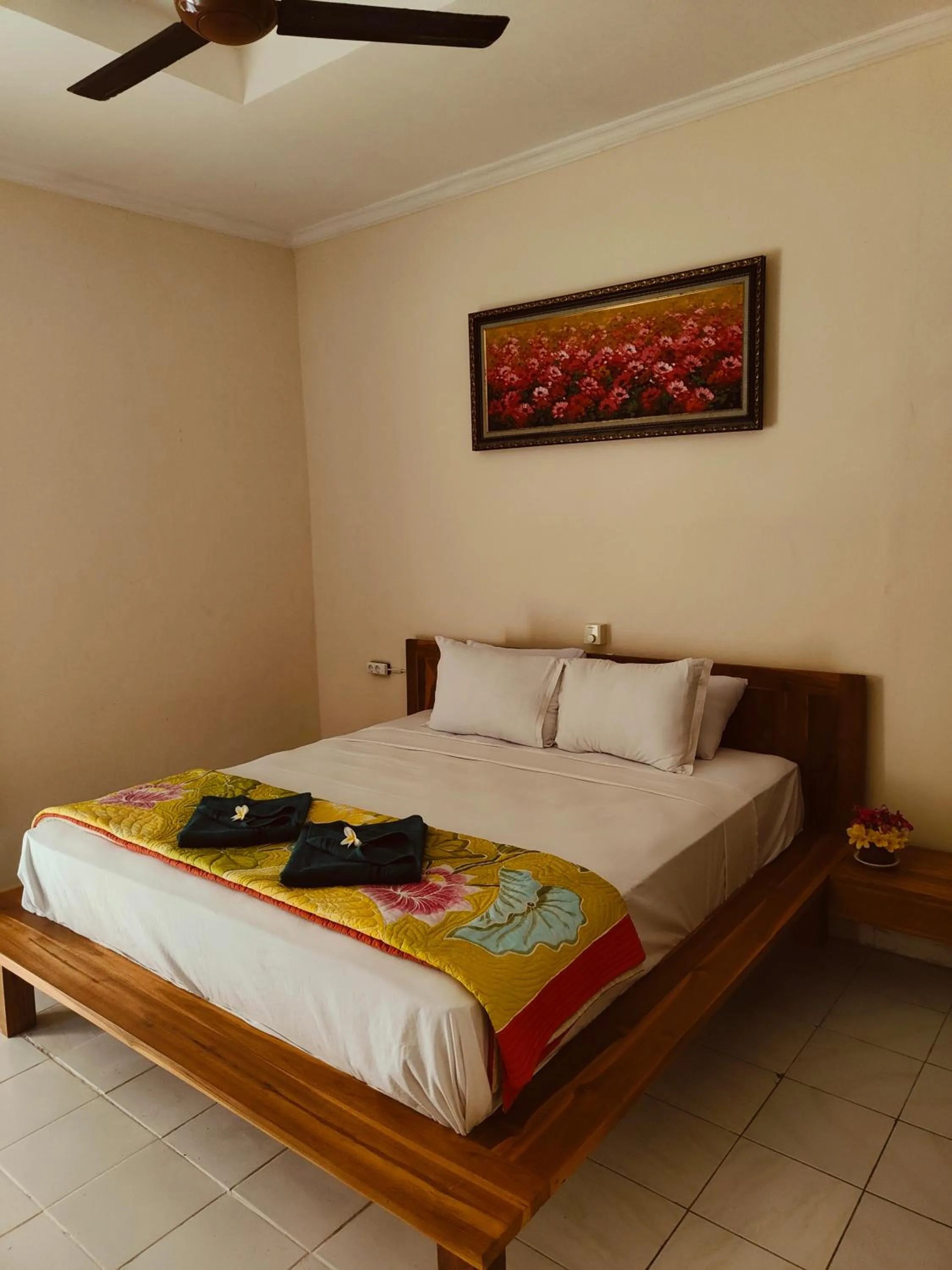 Bed in Berlian Inn Kuta Beach